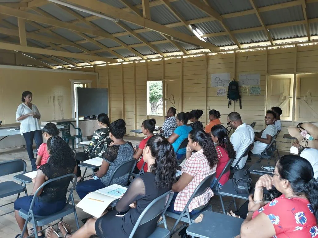Ms. Sharon Slate delivering her presentation to the gathering at Tapakuma.