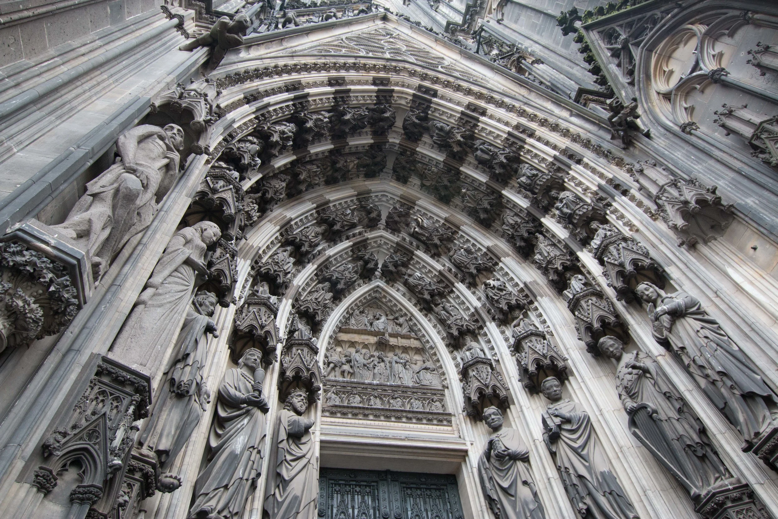 One of the entrances to the Dom. Those are all small statues of, I'm assuming, saints, and perhaps some other important people.