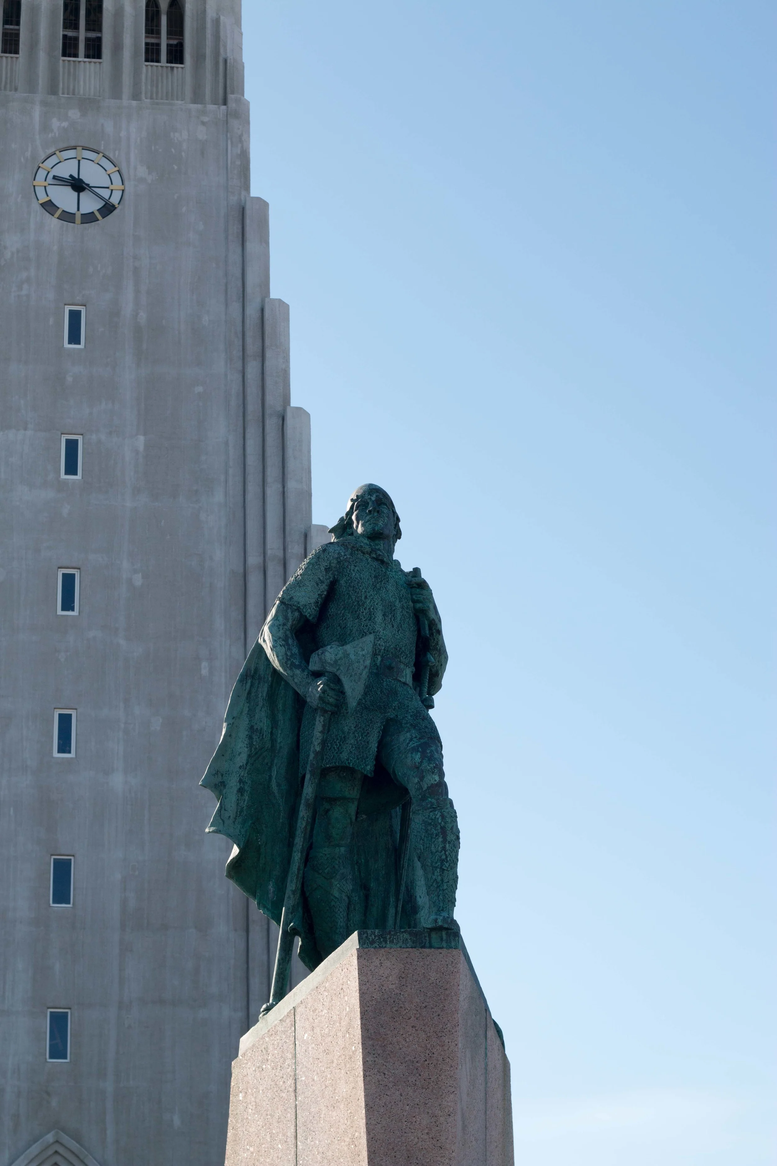 Statue of Lief Erikson outside Hallgrimskirkja with the church tower in the background