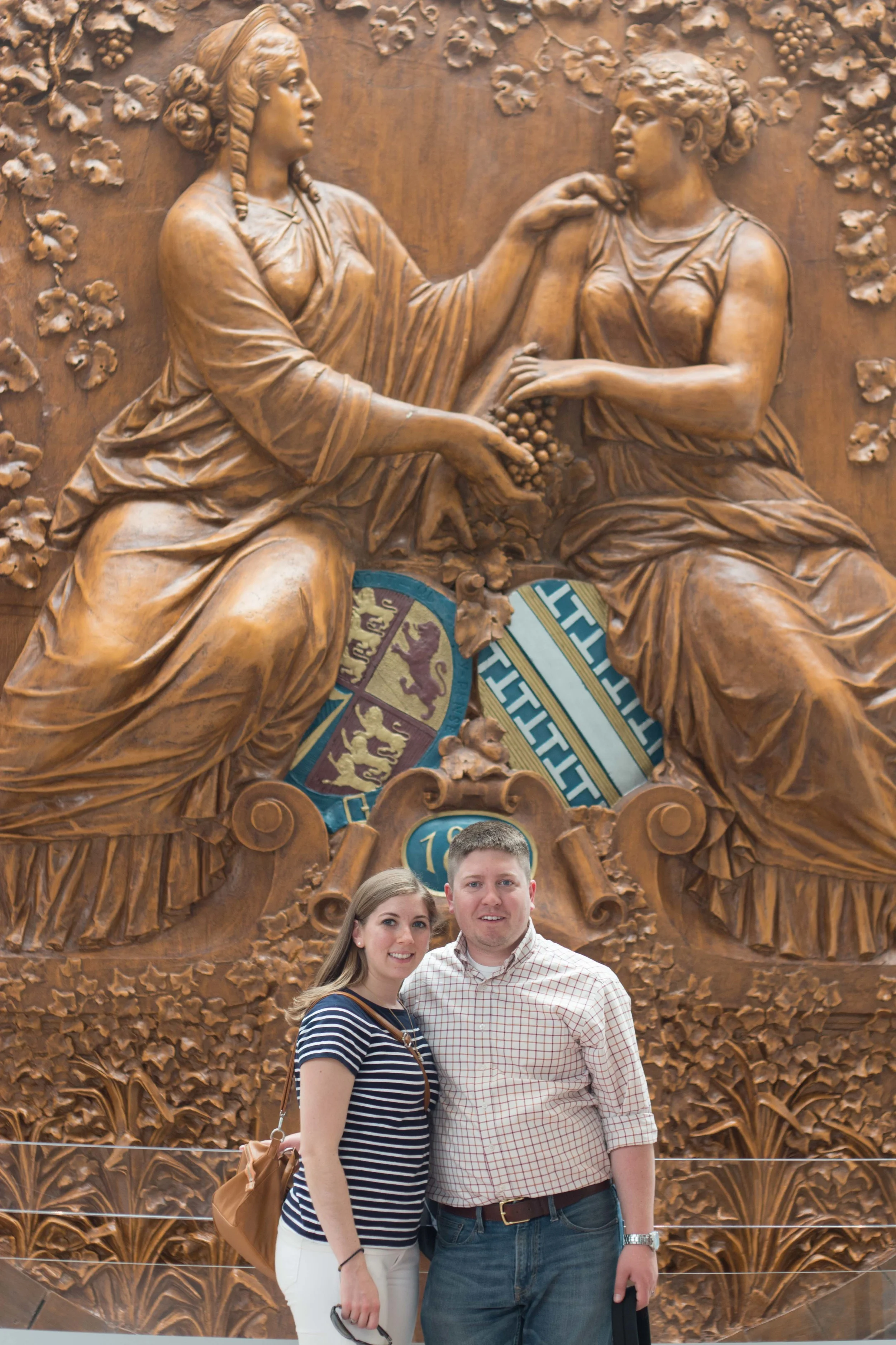 Aaron and I in front of a wine barrel that holds over 219,000 bottles of wine
