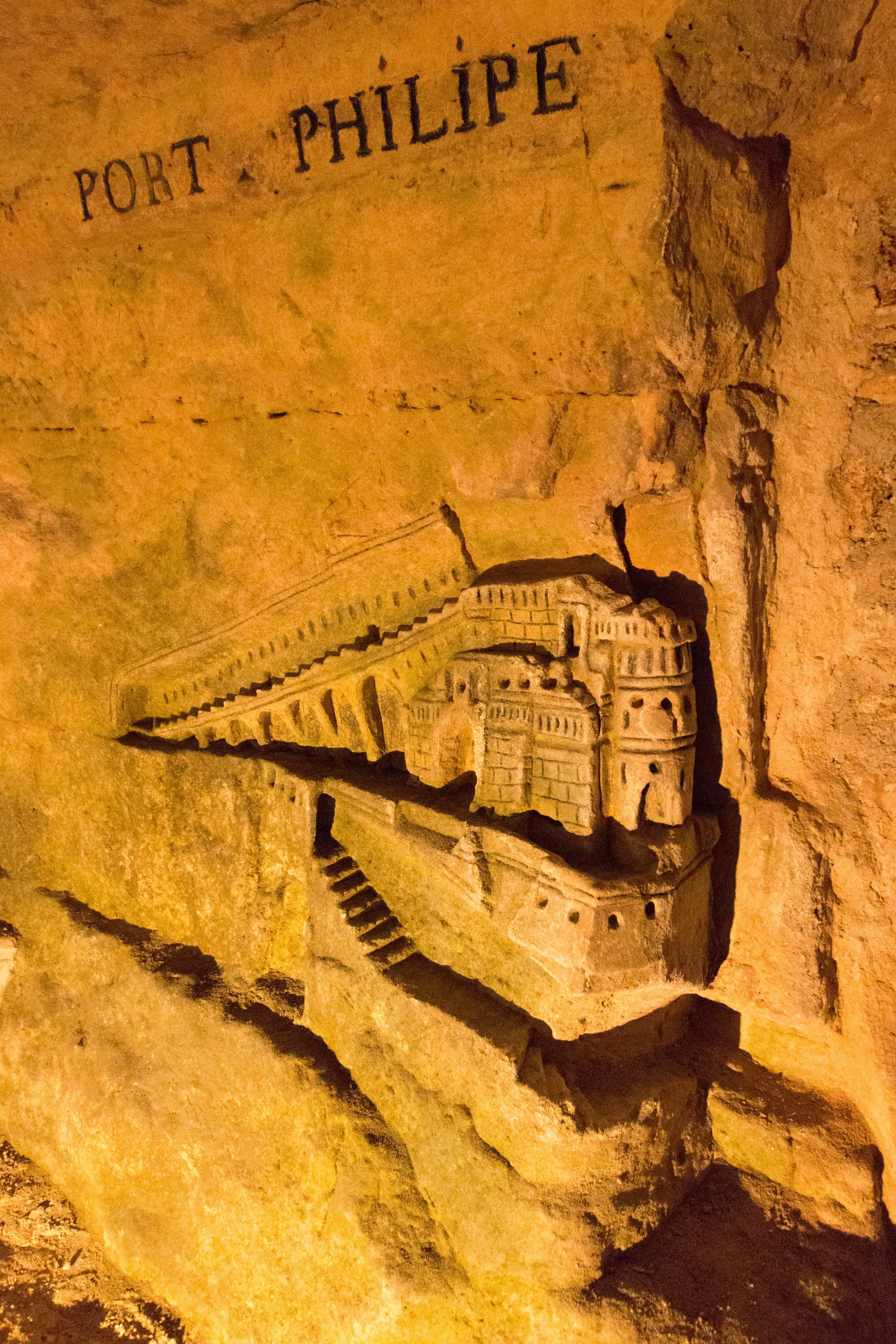 Intricate carving of Port Philipe in the tunnels