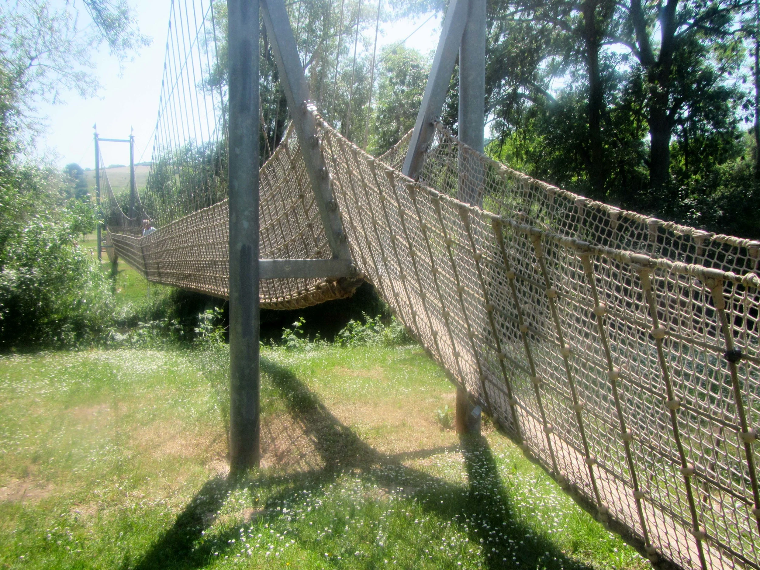 The suspension bridge over the river. There was also a raft that you could use to cross, but a suspension bridge is more fun