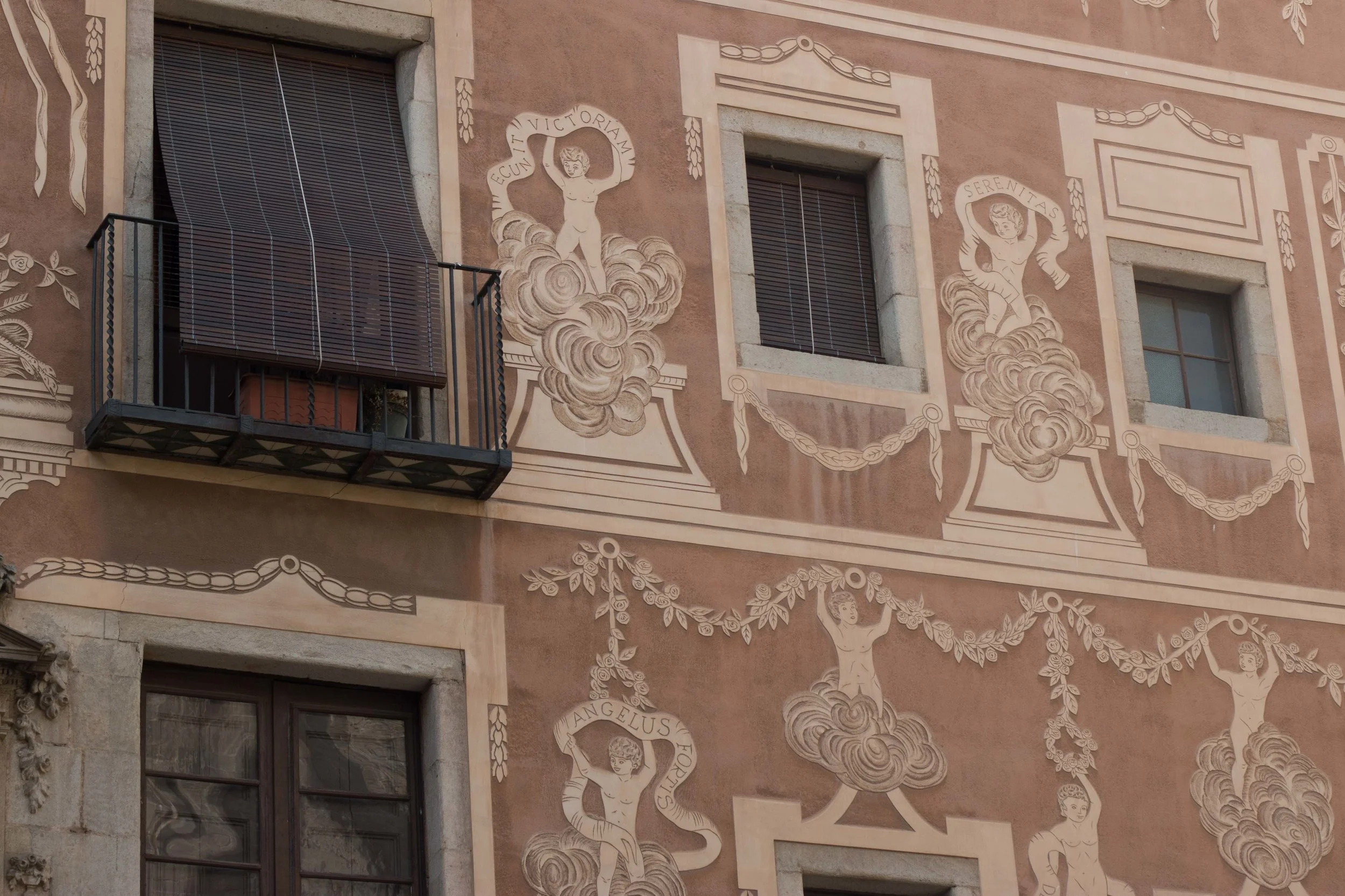 Intiricately carved Building facade at Placa del Pi.