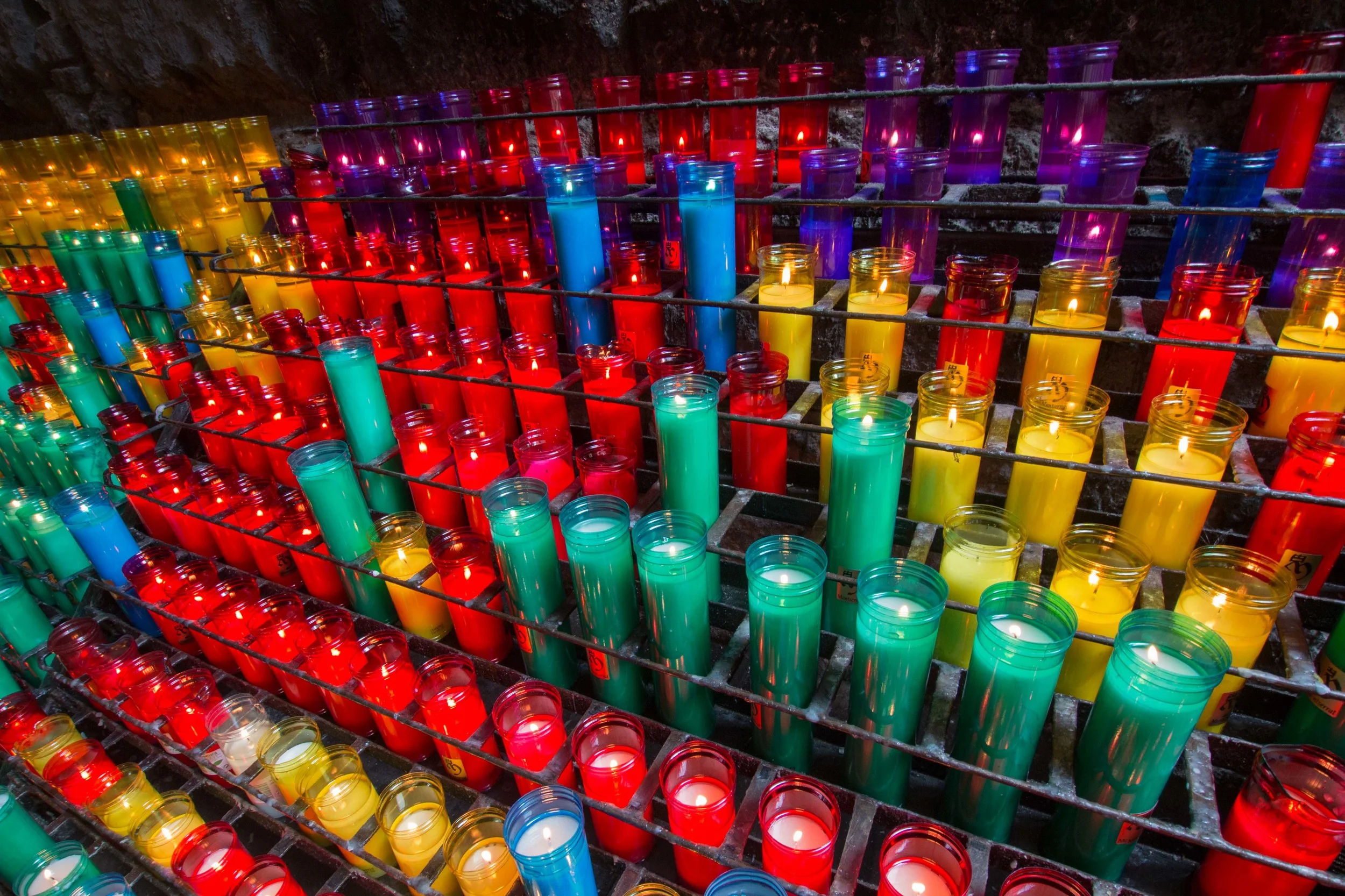 The colorful candles lit by visitors along the Ave Maria Path