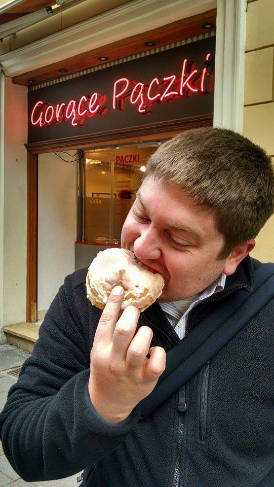 aaron eating his Paczki. He was much more civil about it, I gobbled mine down.