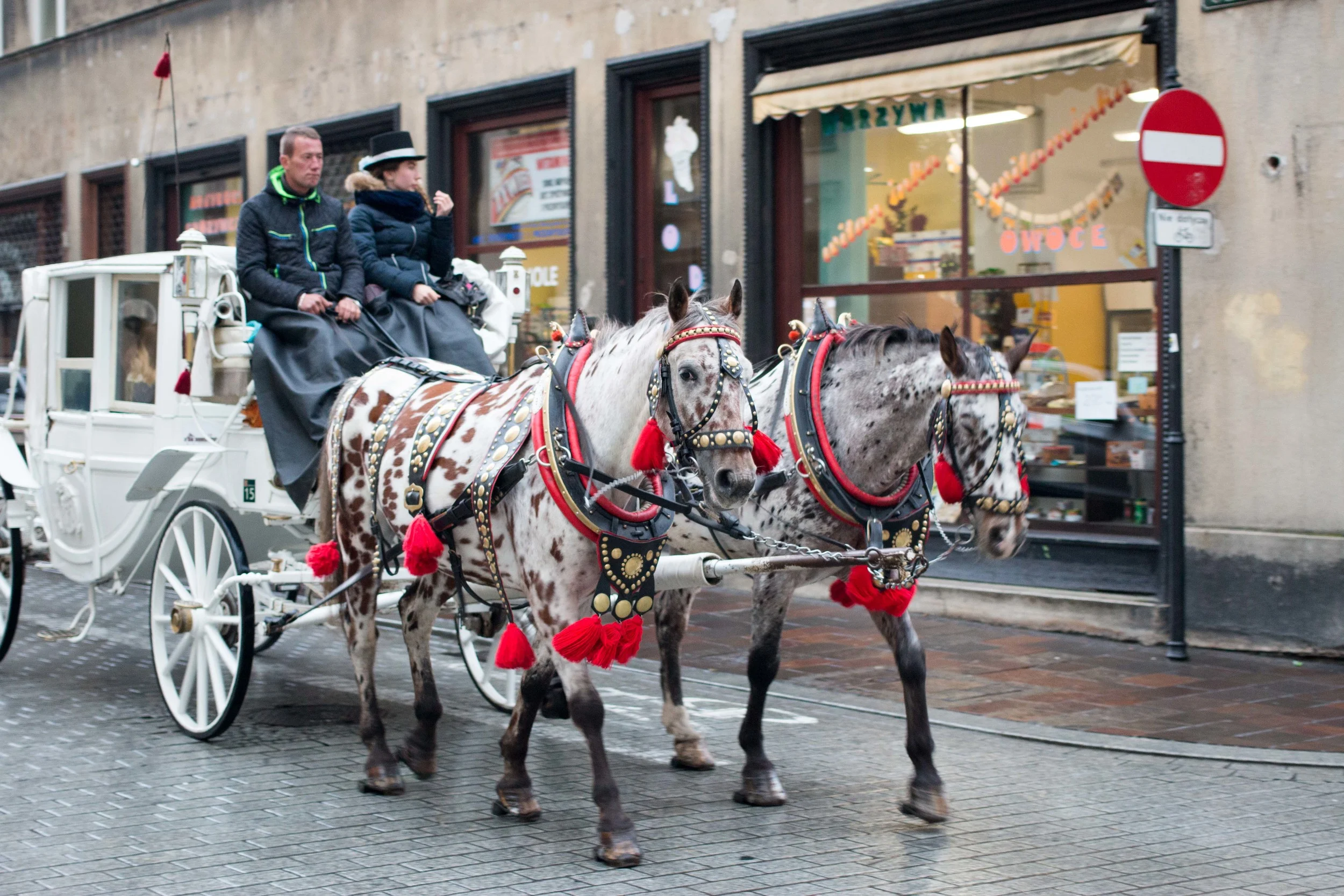 Carriage rides around the old town, drawn by traditionally decorated horses.