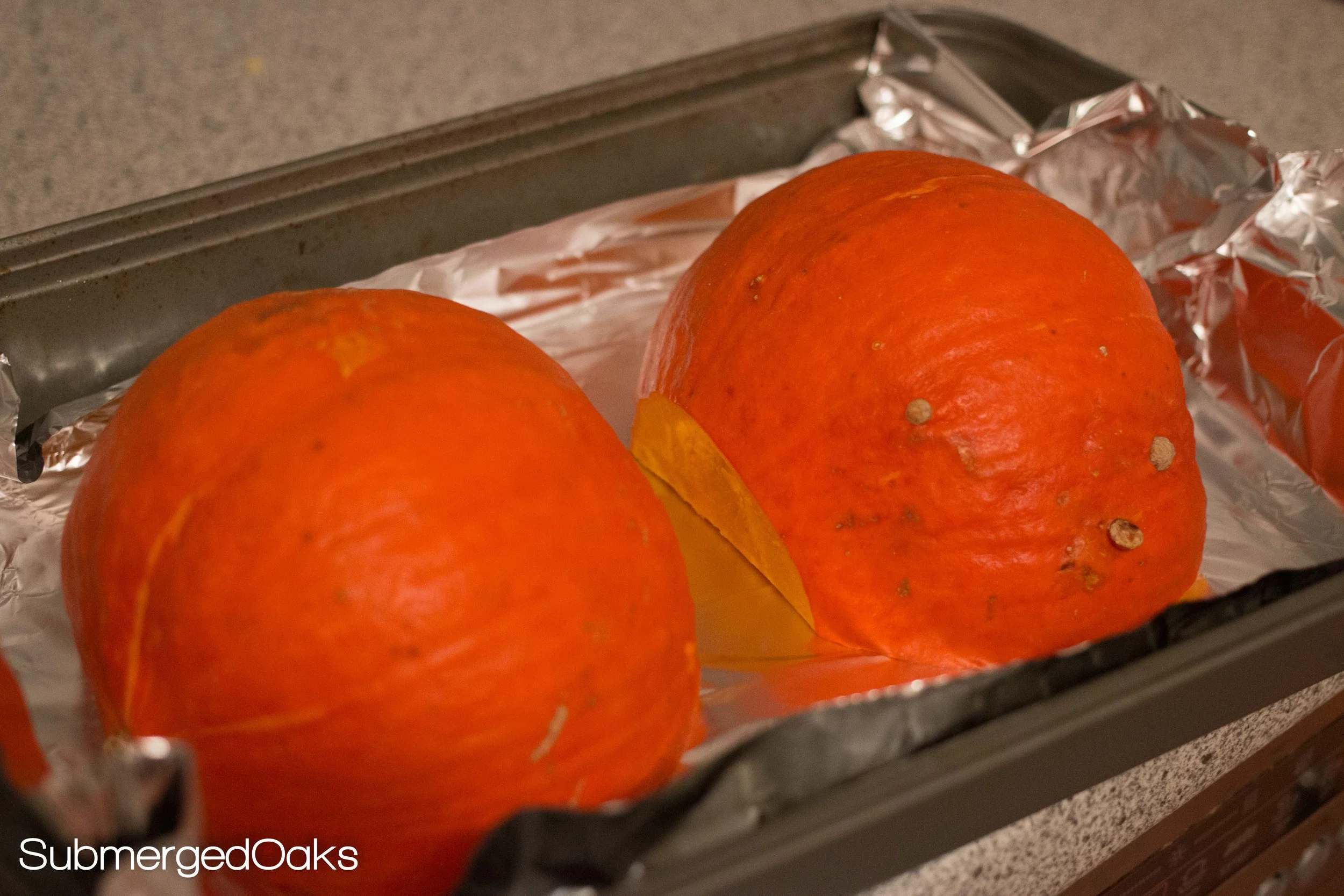 Pumpkin getting ready to go into the oven for roasting before eventually ending up in pie