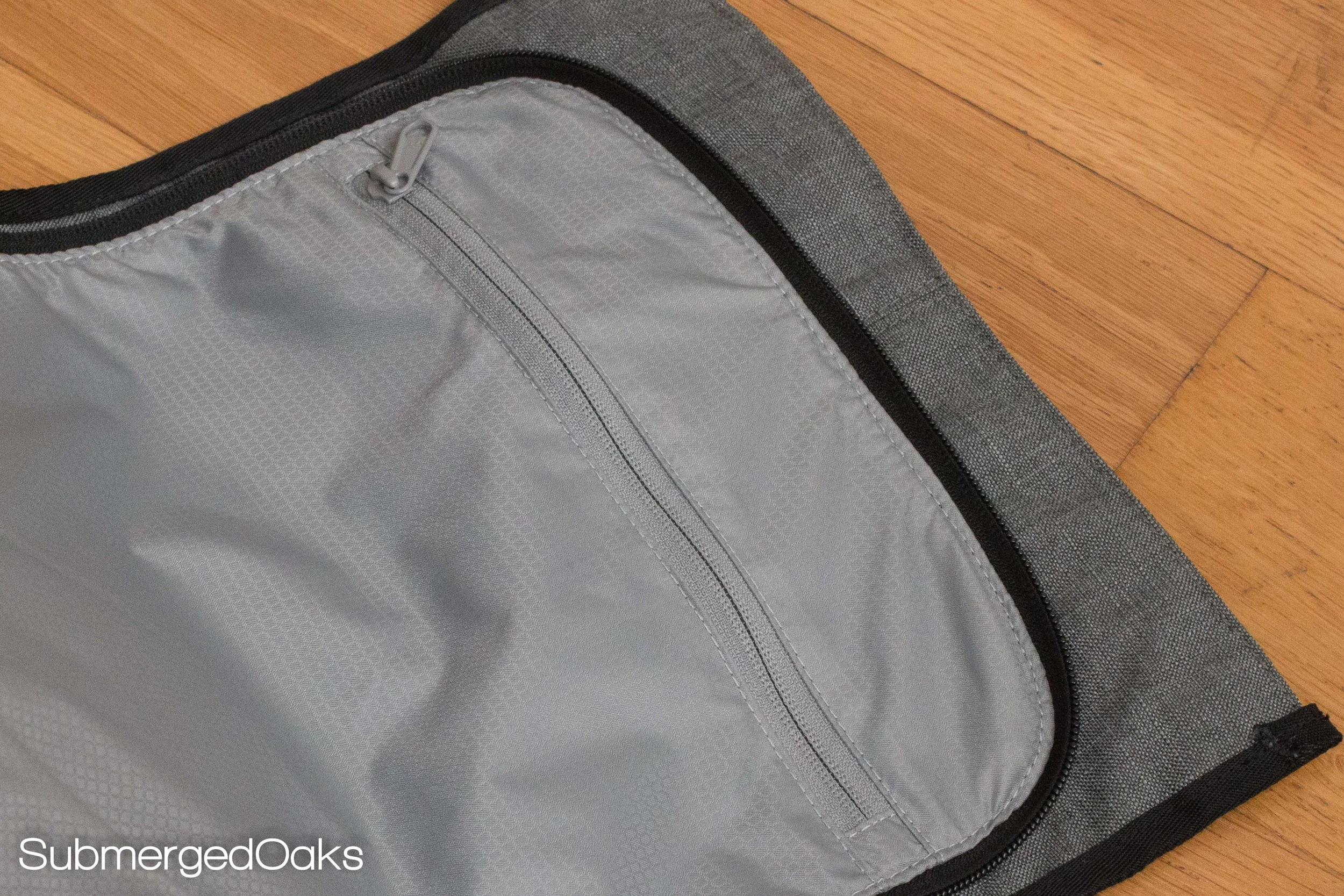 an additional pocket on the opening flap is included for separation of dirty clothes, toiletries, etc.