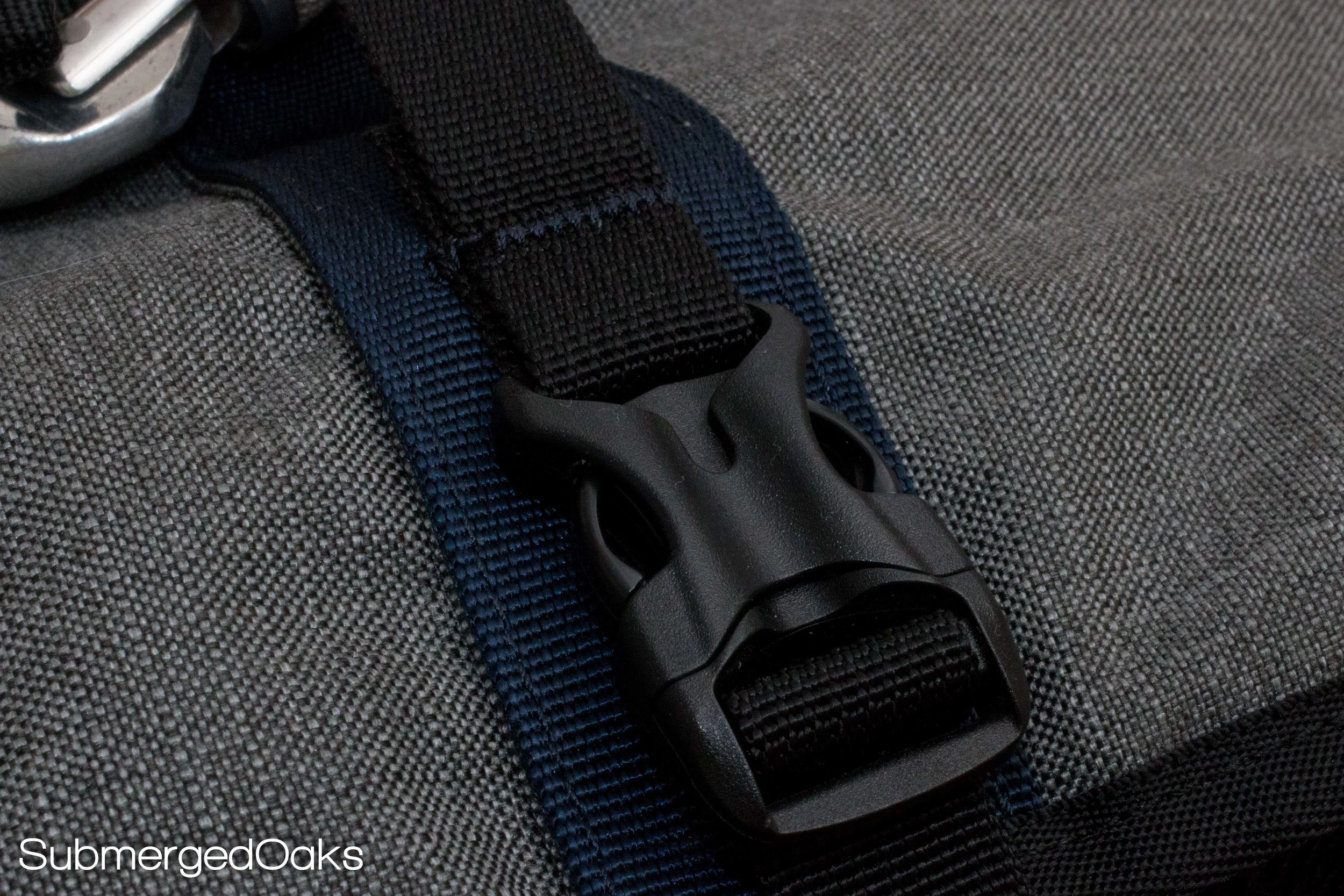 The main compartment is secured by a double zipper a 4 buckles that also act and compression straps, helping to reduce the overall size of the bag