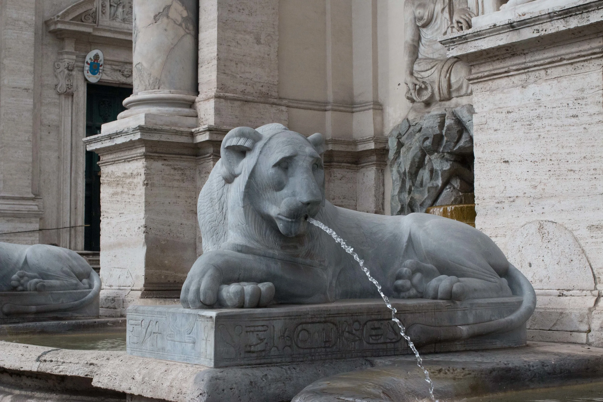 One of the four lions at Fontana dell'Acqua