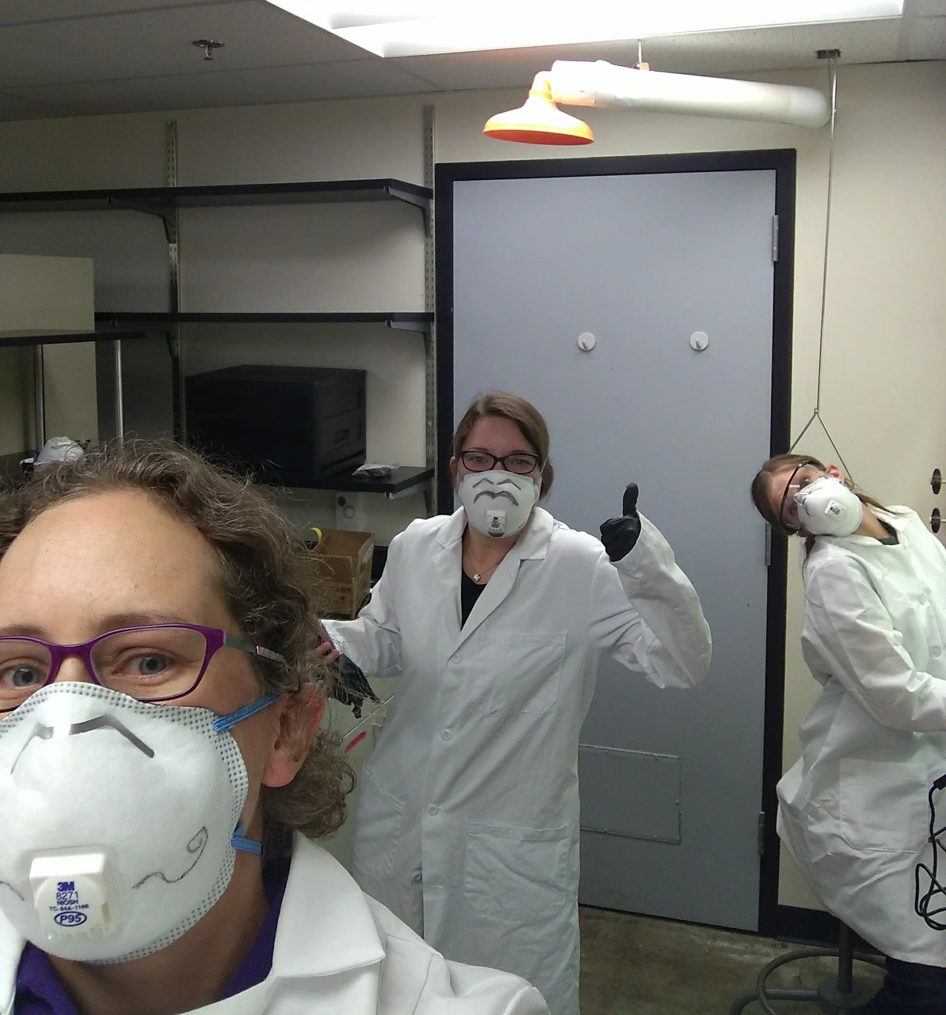 The lab crew during our decomposed human rib dissections. We always wear proper personal protective equipment, including glasses, masks, gloves, and lab coats.