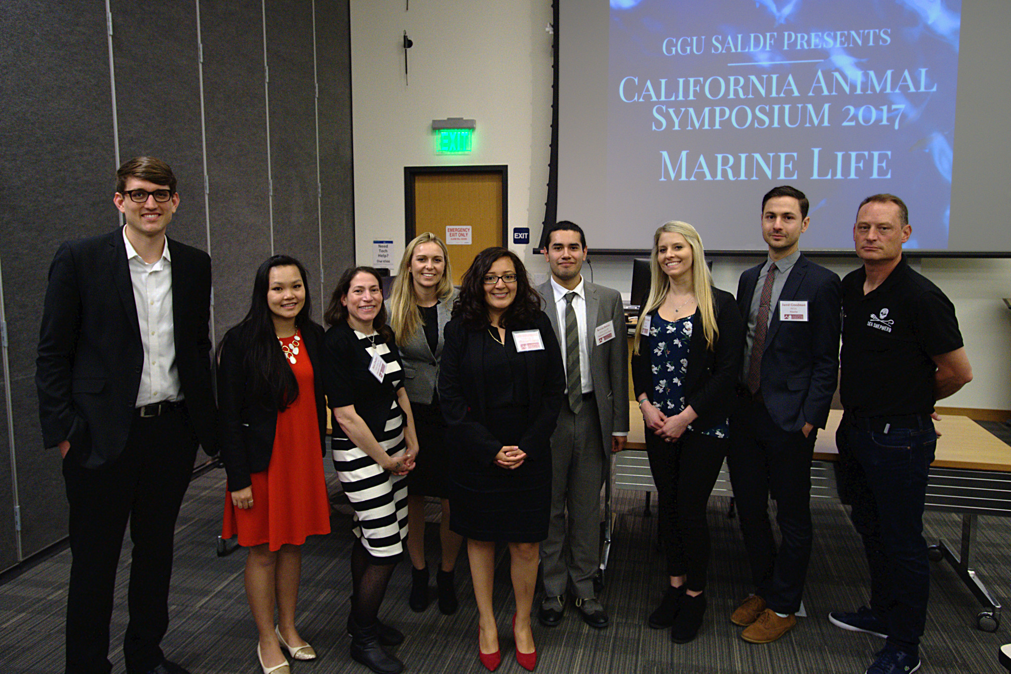Photo of panelists and organizers for the 2017 Symposium. Left to right: Chris Berry, Venus Ho, Sara Dudley, Tara Cooley, Catherine Campoverde, Kevin Buiza, Kelly Levenda, Jared Goodman, and David Hance.