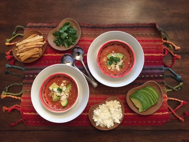 Tortilla soup and its yummy friends to garnish! 