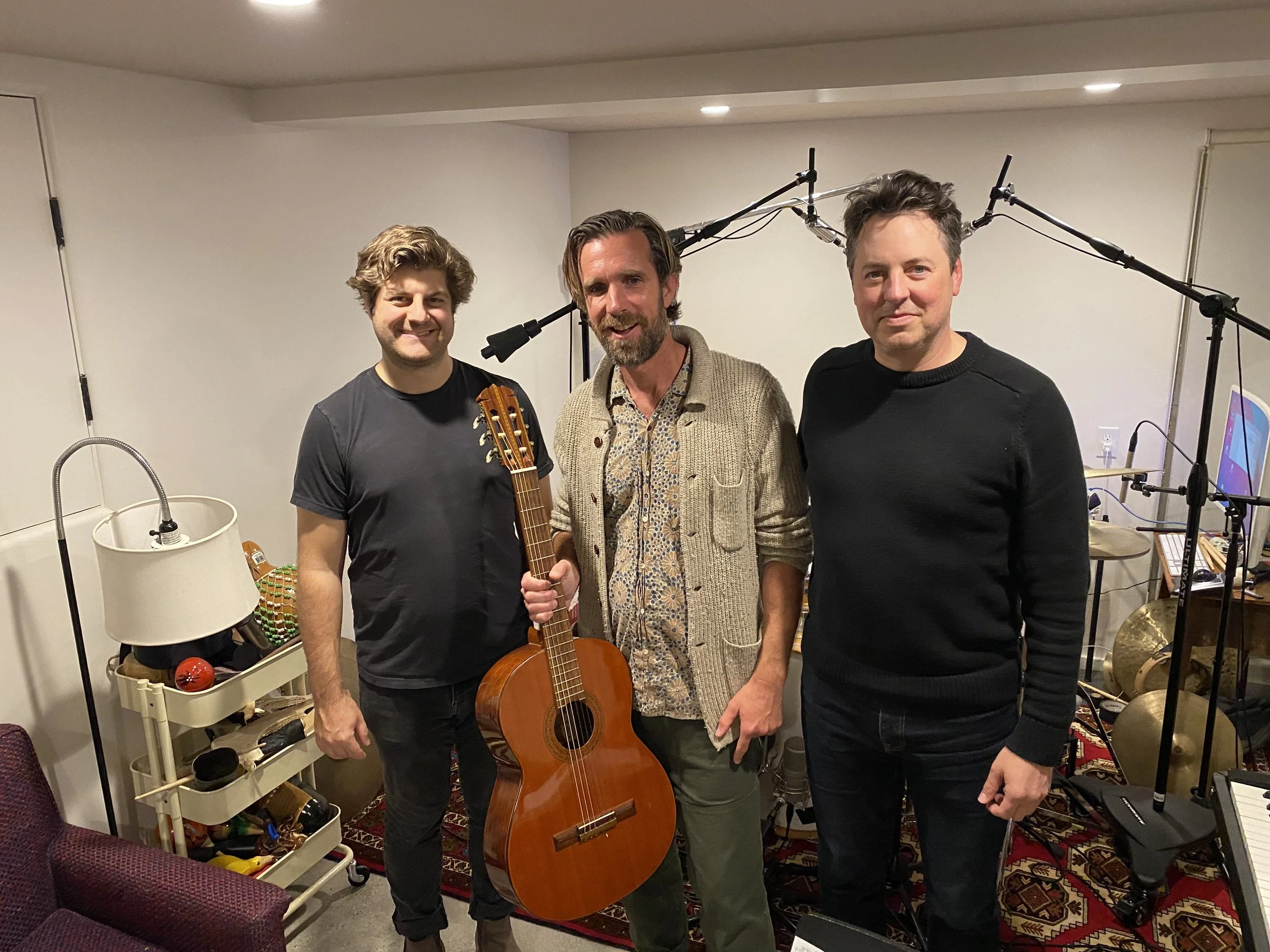Drummer Jake Reed, left. Bassist Sean Hurley, right. With Don Cadora.