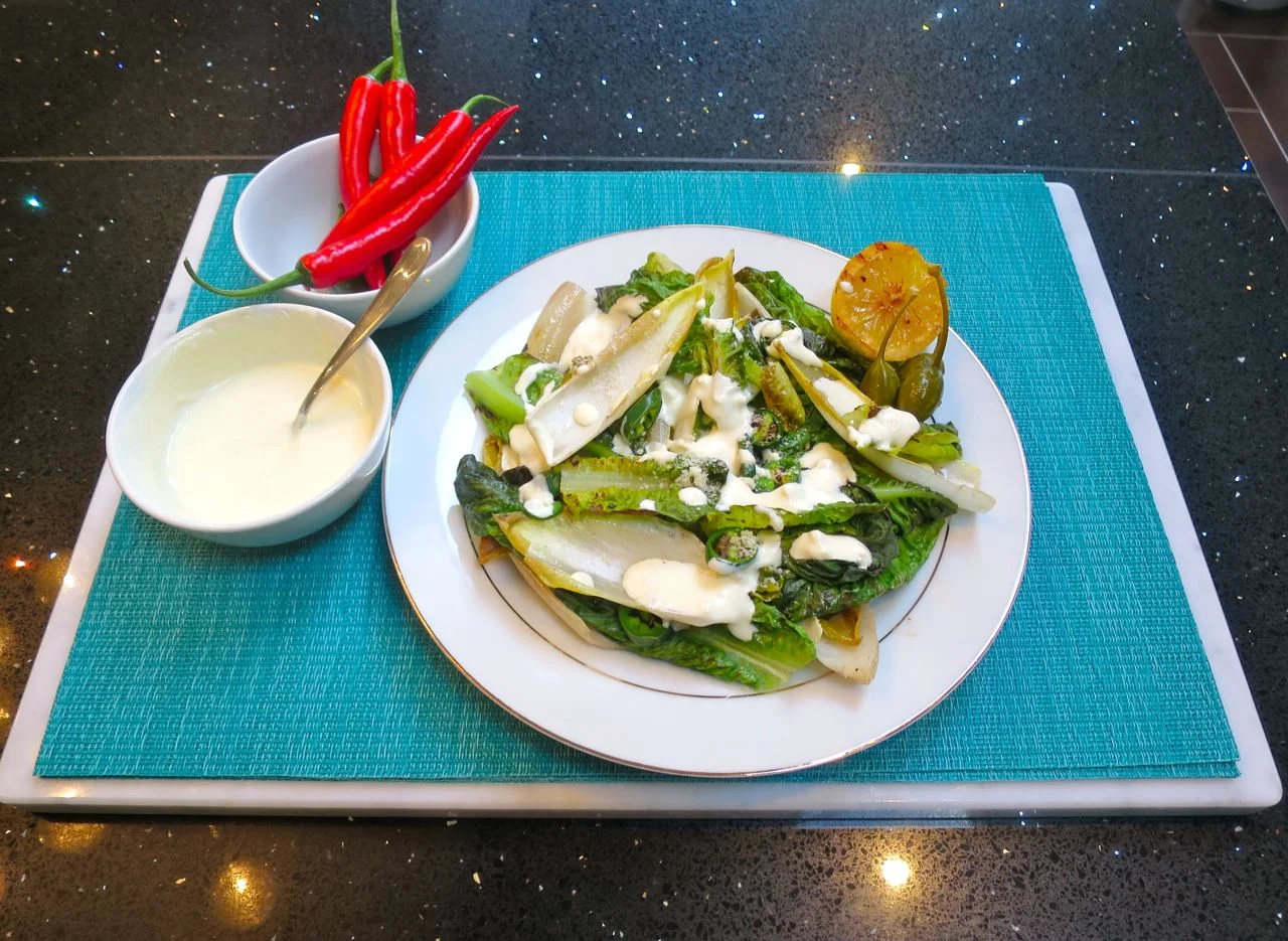 Chargrilled Chicory and Little Gem Salad served with Caper-berries.