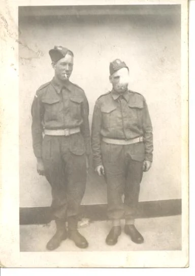 My Grandfather (to the left) and his brother-in-law in their Home Guard uniforms getting up to some cheeky antics!