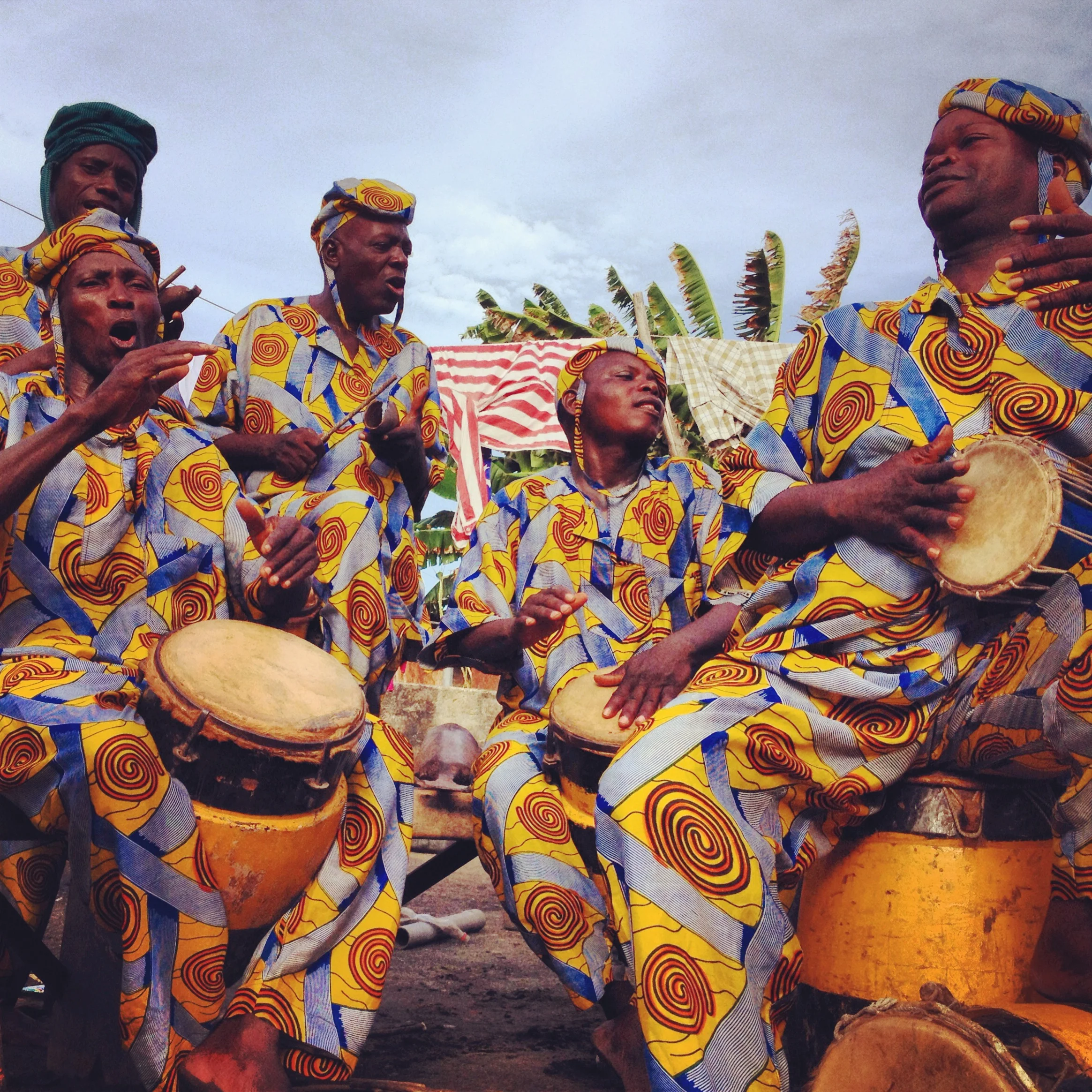 Drummers from the Kini Kini Cultural Troupe performing a traditional rhythm called Agbehoun