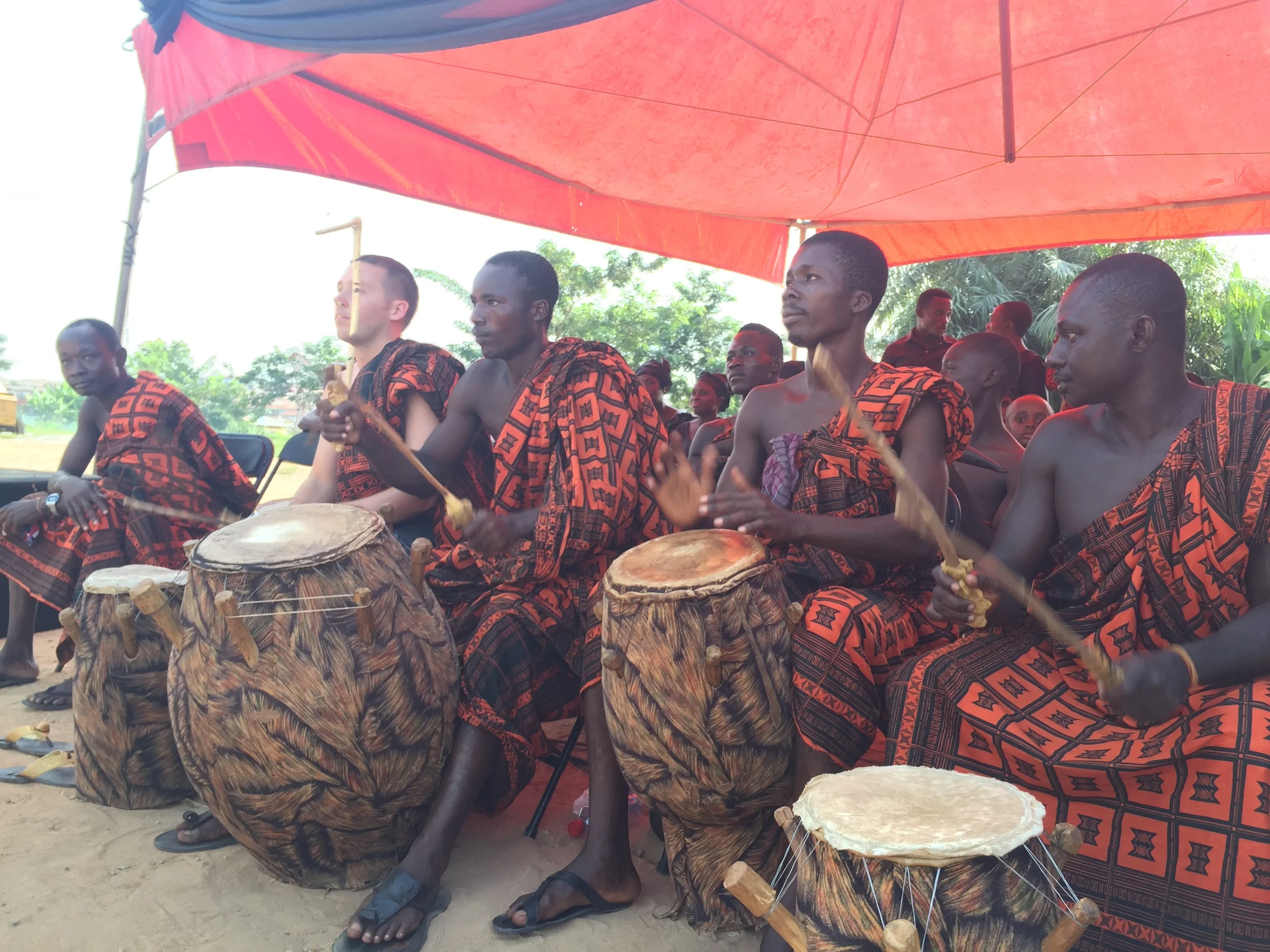 Drumming with the Kokofu Kete Group at a funeral in Bomso, Kumasi. 