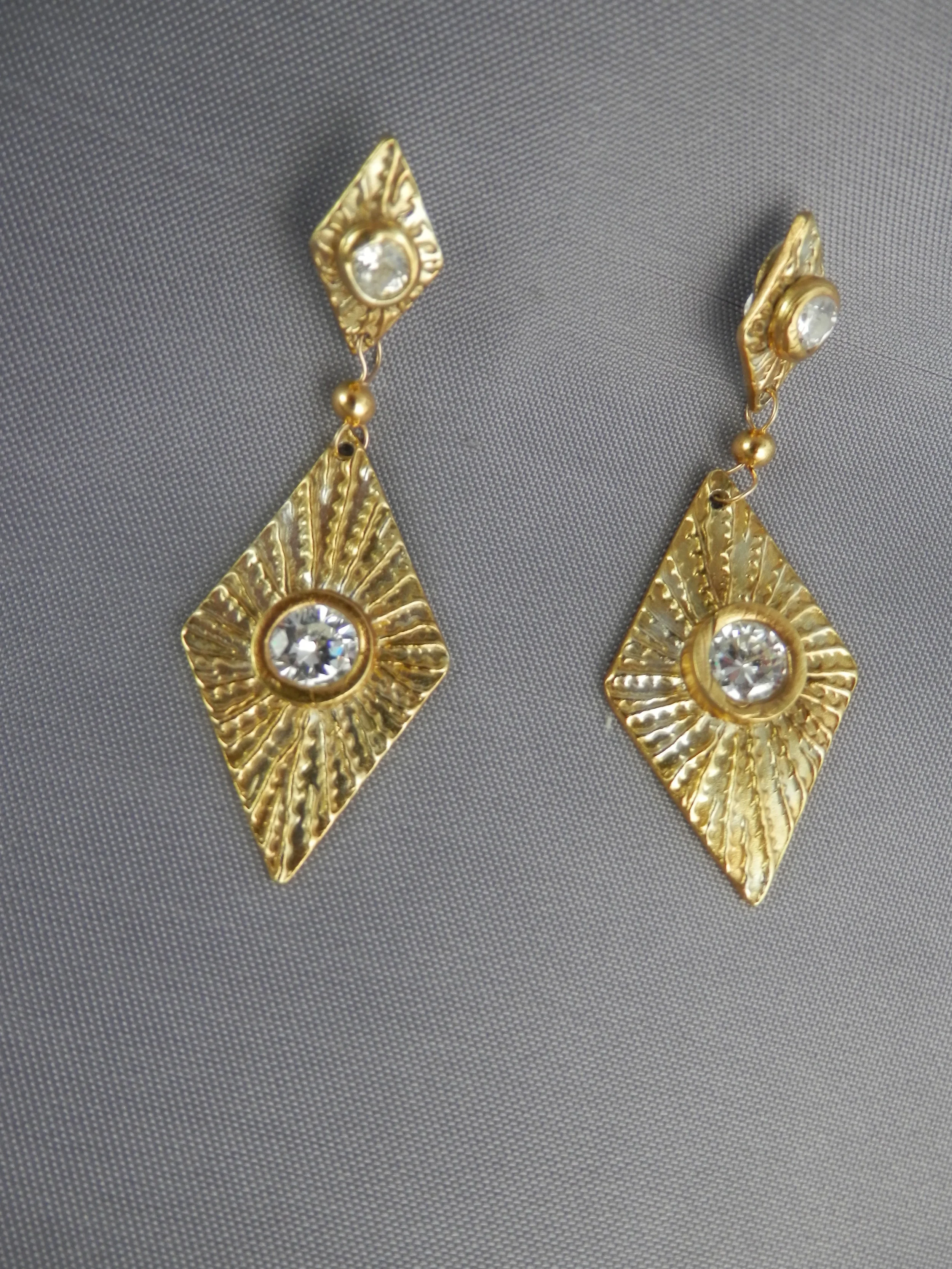 fine silver, gold plating and cubic zirconium