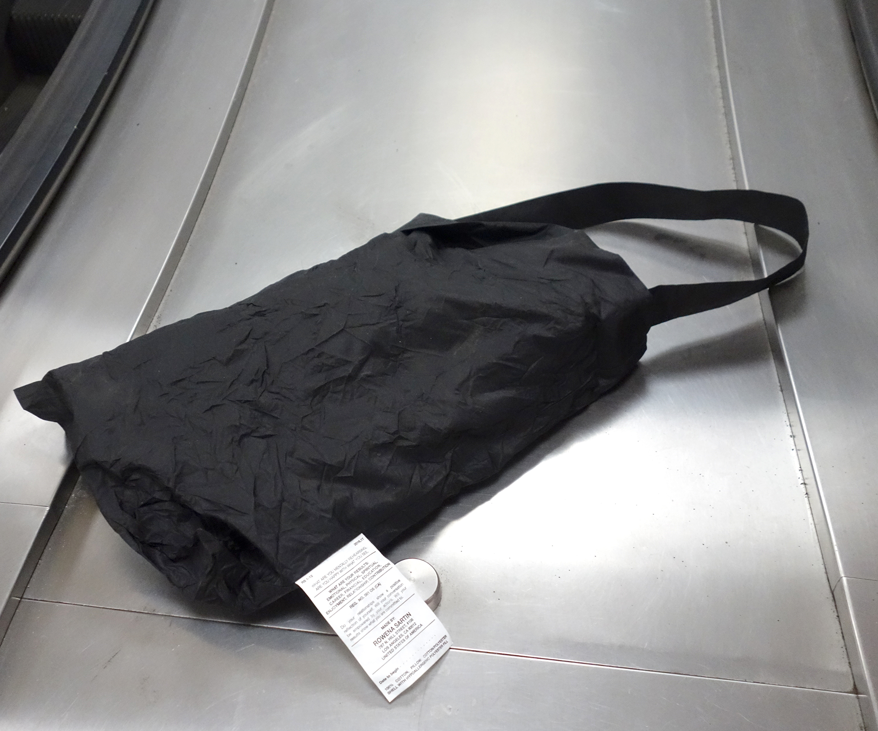 RSlongtote.escalatorweb.jpg