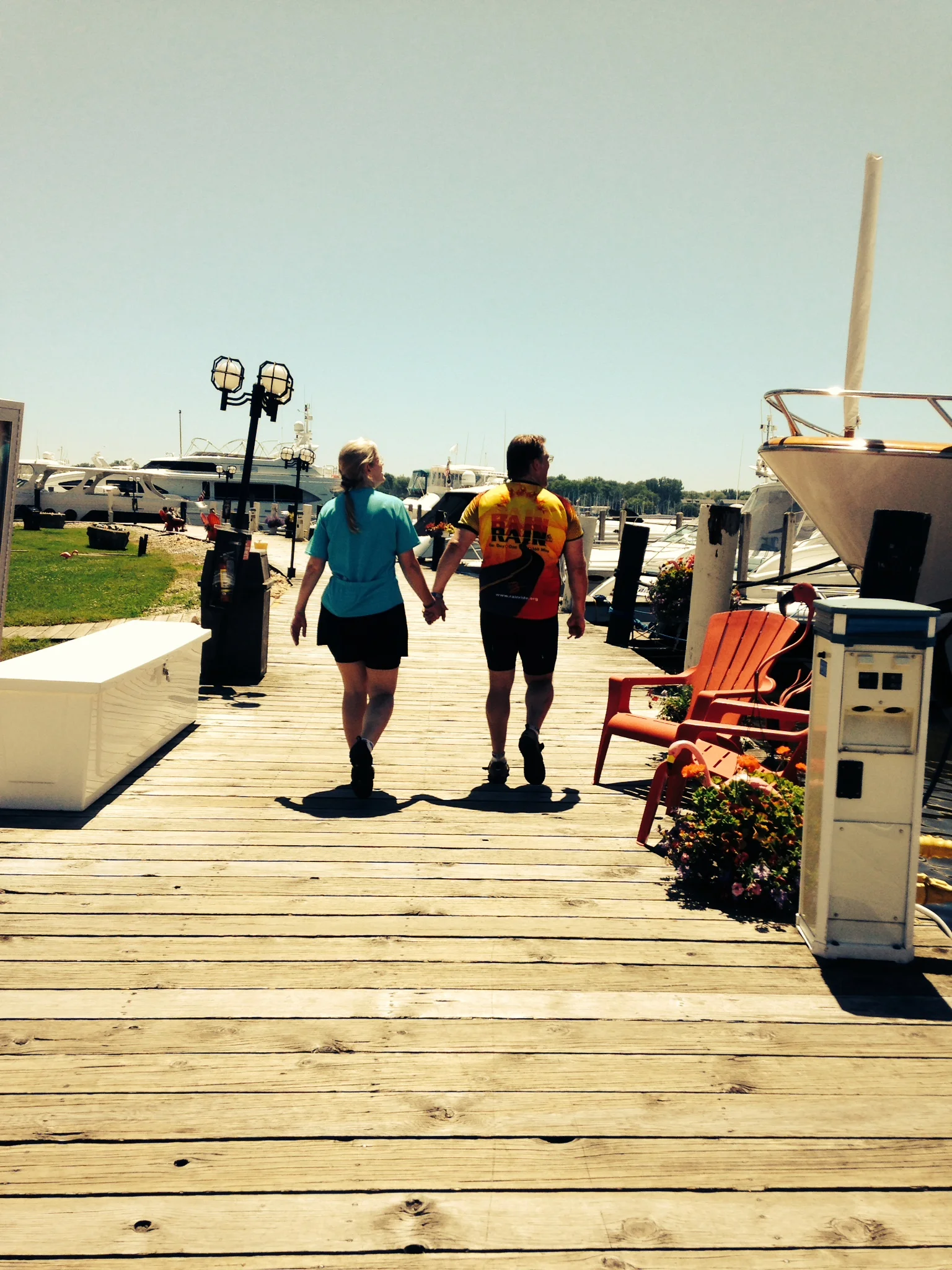 Mom & Dad on the Saugatuck, MI Boardwalk halfway through a 42 mile 25th Anniversary Bike Ride
