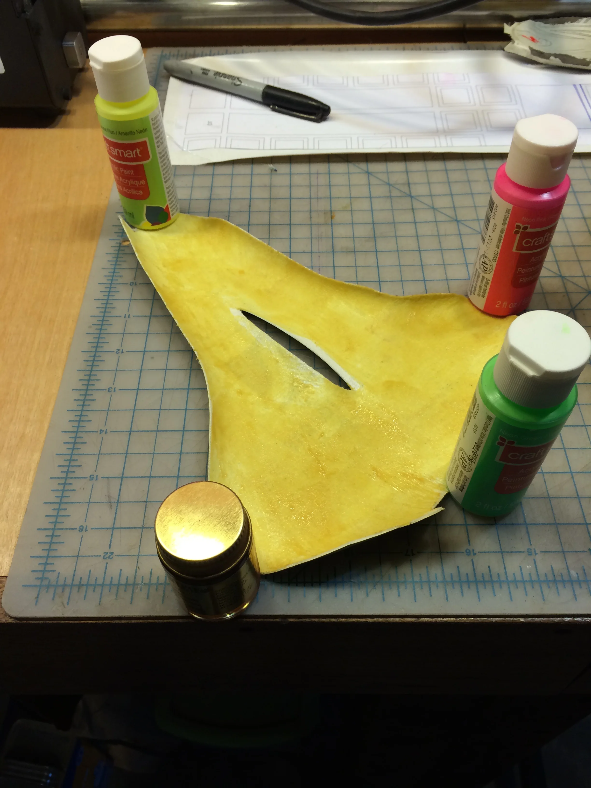 When glueing this stuff it always curls in like this so its a good idea to have something to weight it down near by. Also use multiple layers of glue because it gets absorbed. and you want good adhesion here.