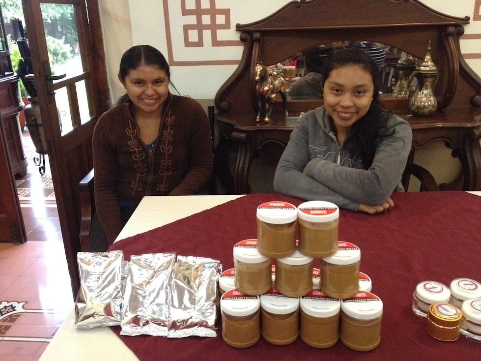 Lilian and Lidia are all set up with their bags of roasted peanuts and homemade (and delicious) peanut butter.