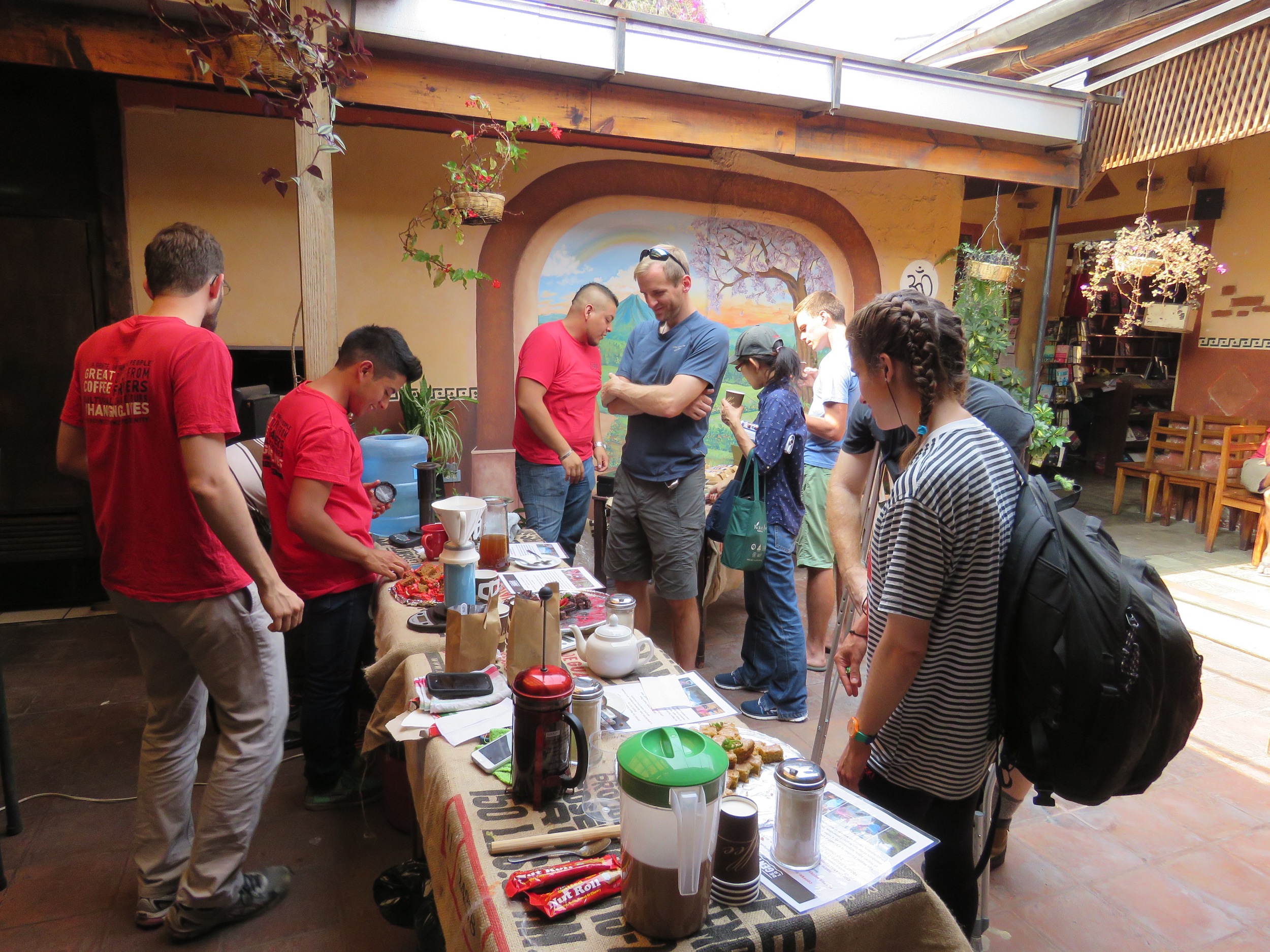 people surrounding cake