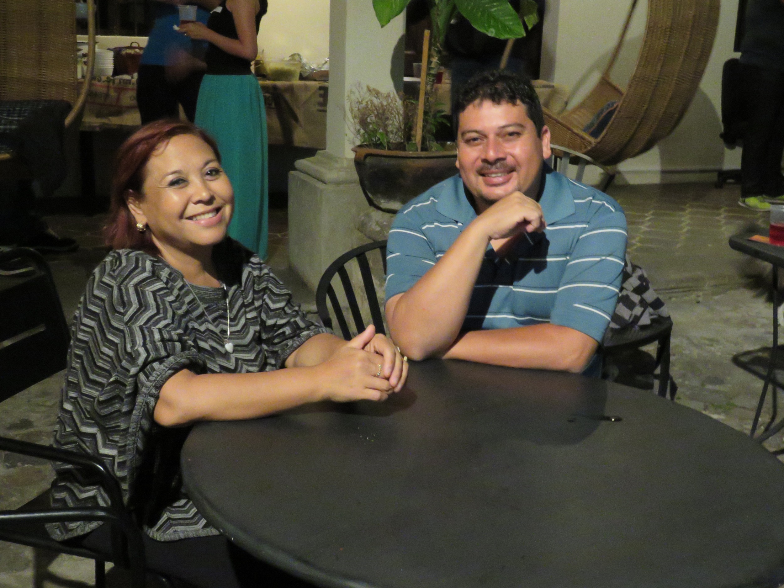 couple smiling at table