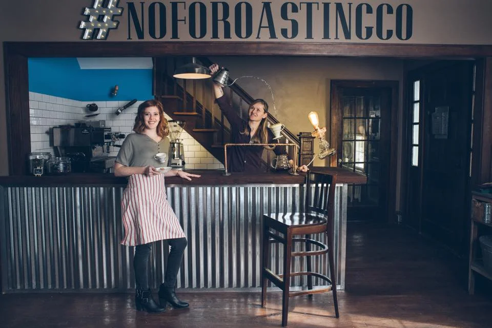 Jess & Jenni at their coffee bar in North Fork Roasting Co. when they first opened
