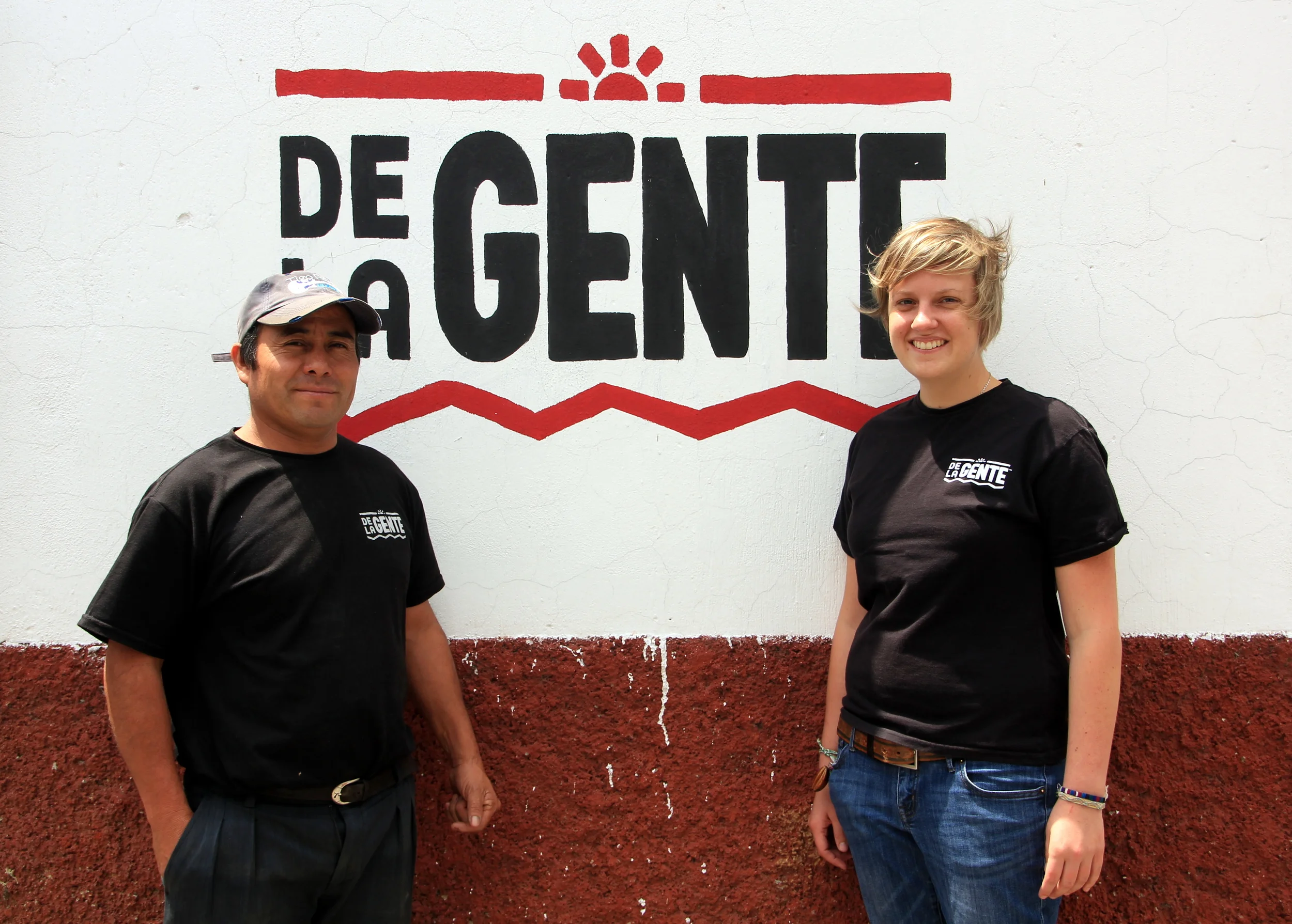 Froilan and Beth outside the De la Gente office