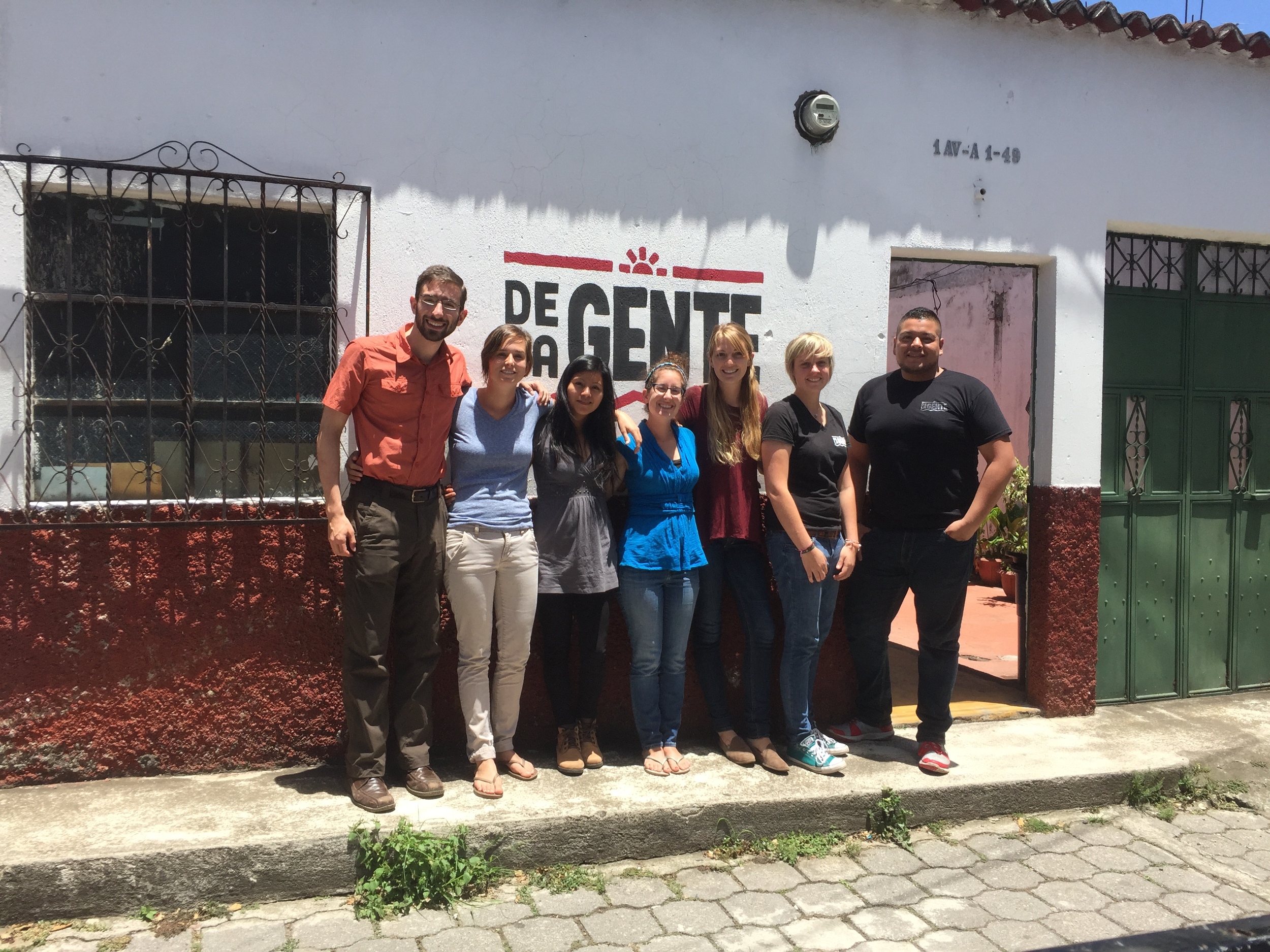 Lola with the team at De la Gente