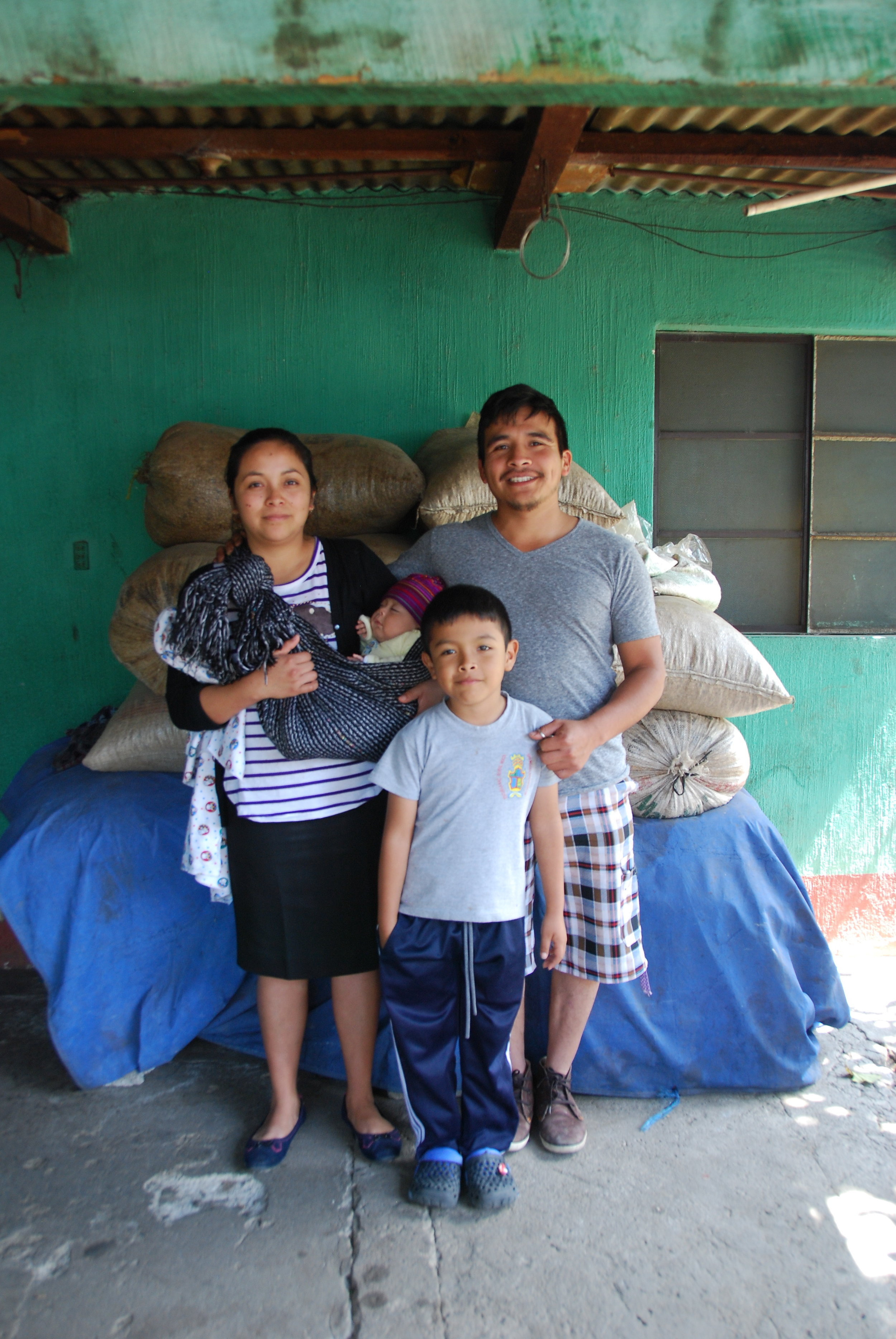 Angel with his wife and children