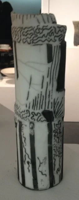 Winner of the President's prize - one term classes for free. Exquisite patterns on this naked raku vessel.