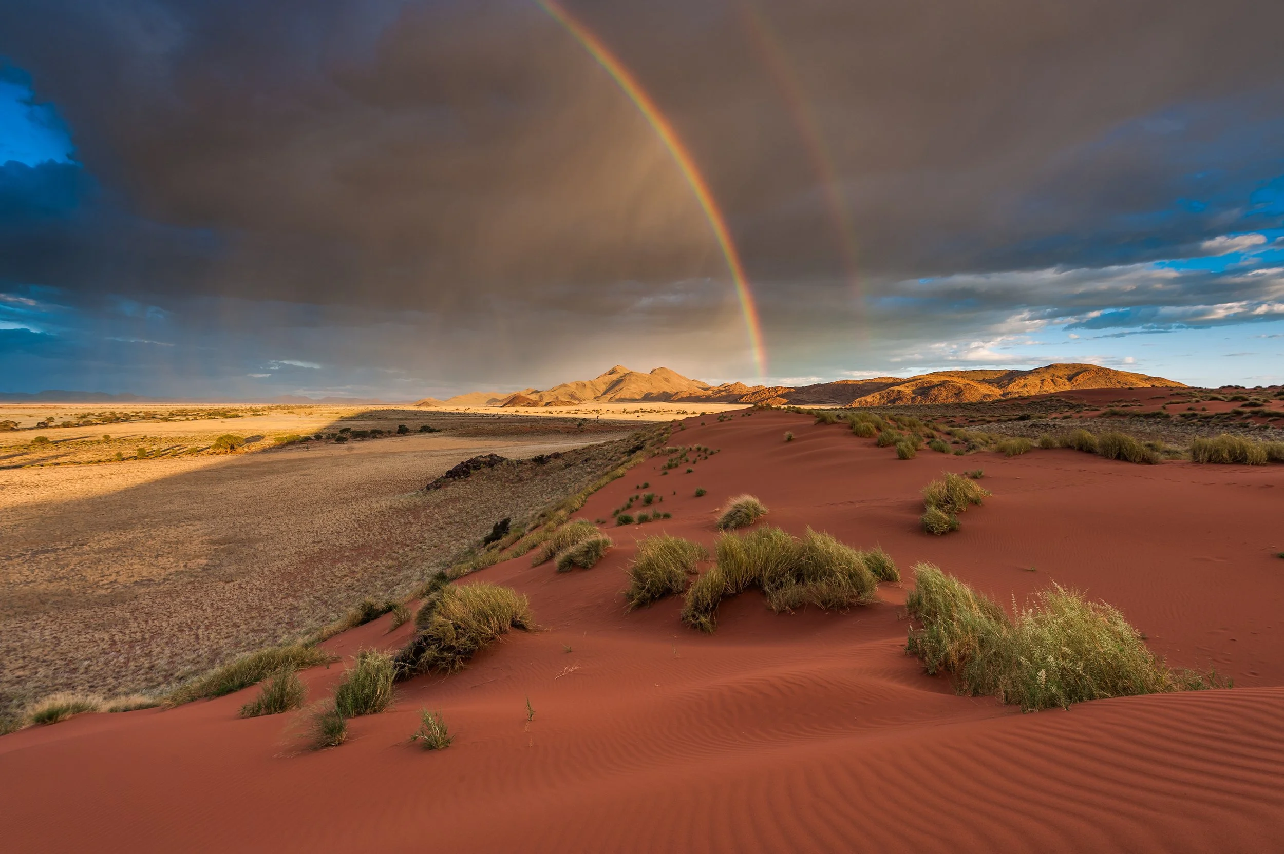 a rainbow shows up in the Namibia desert
