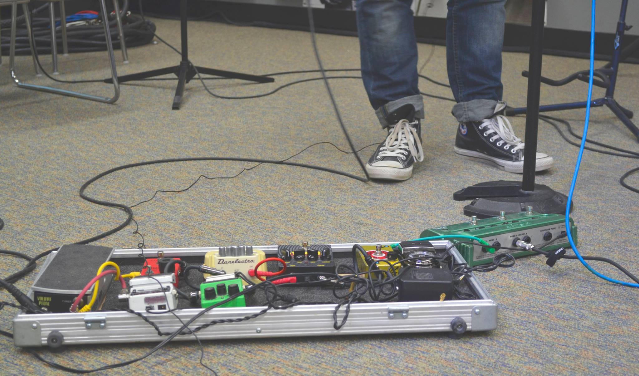 A bundle of distortion pedals used during a jam session