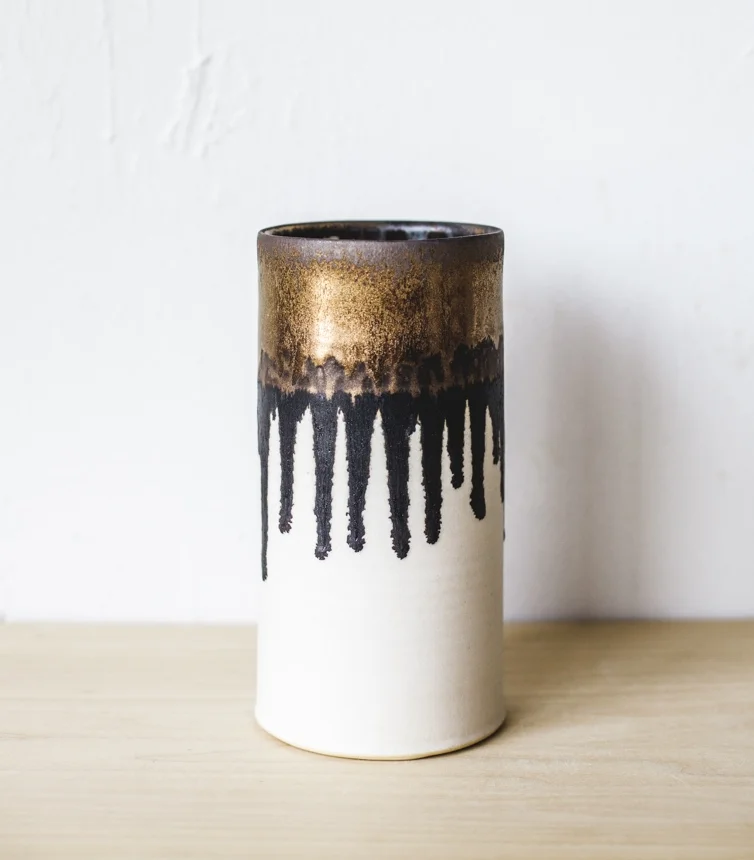 Tall white and bronze handmade ceramic vase