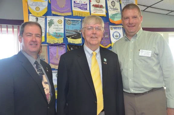 Charlottetown Rotarian Tom Wilkinson, center, meets will Summerside Rotary Club president Nelson Snow, left, and Rotary meeting chair David Anderson, following his address to the local club about the success of the Korean Friendship Network program. – Mike Carson/Journal Pioneer