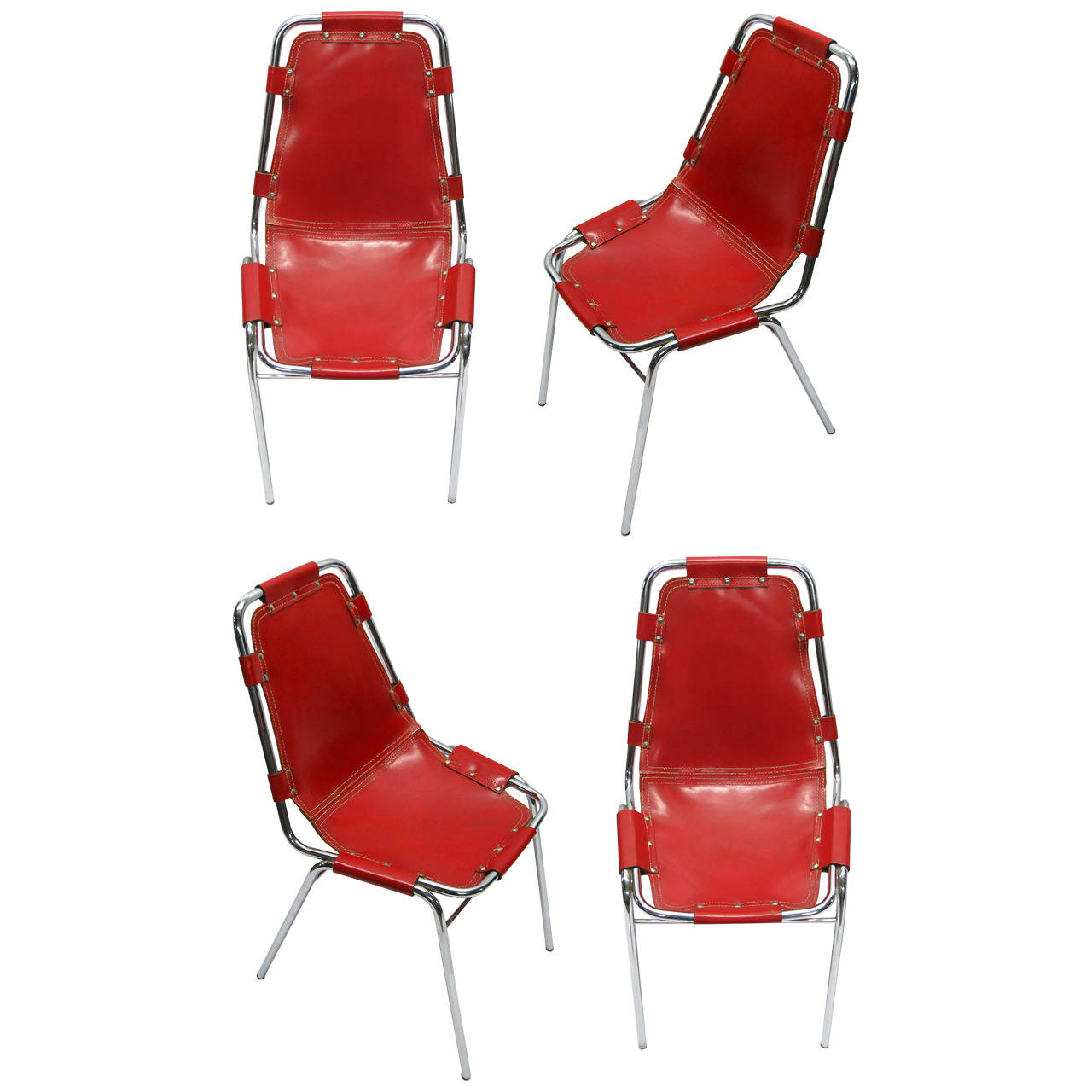 four red chairs by charlotte perriand