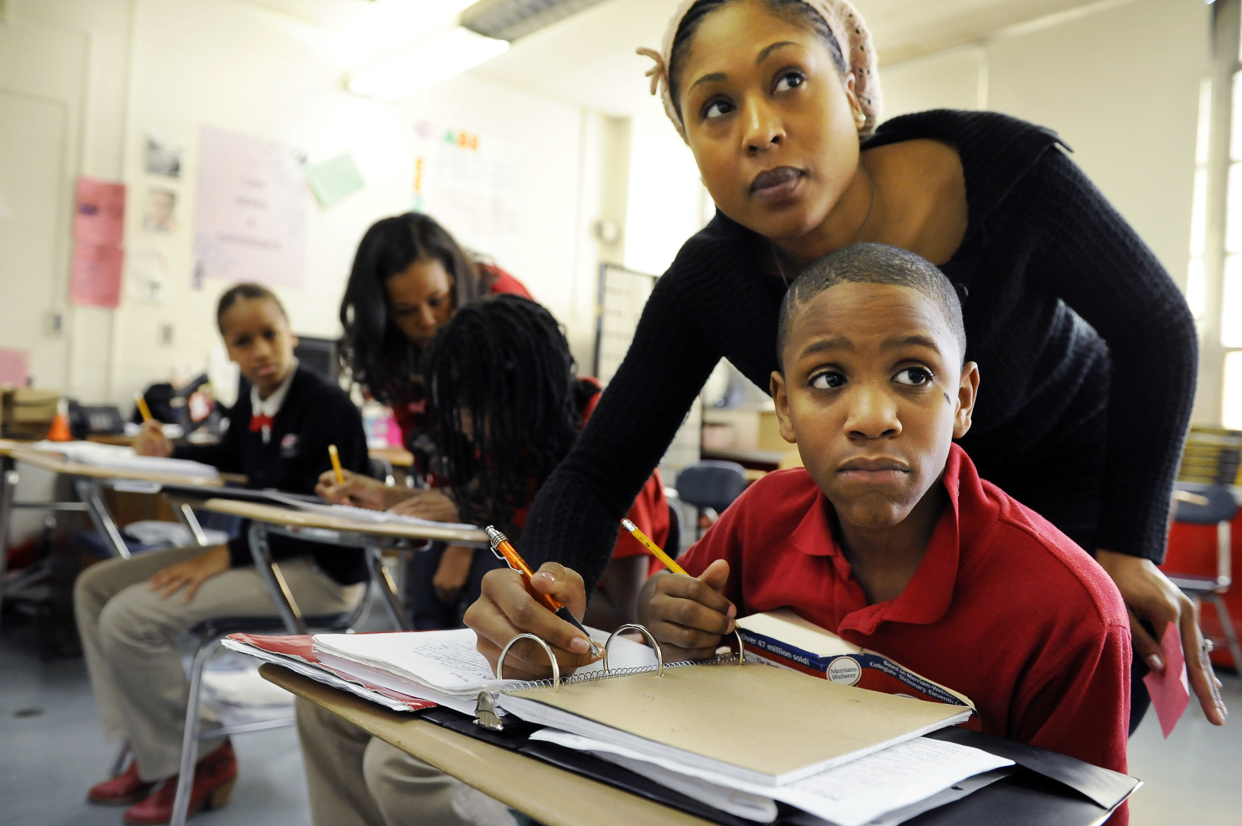 African-American Female Teacher Classroom Student.jpg