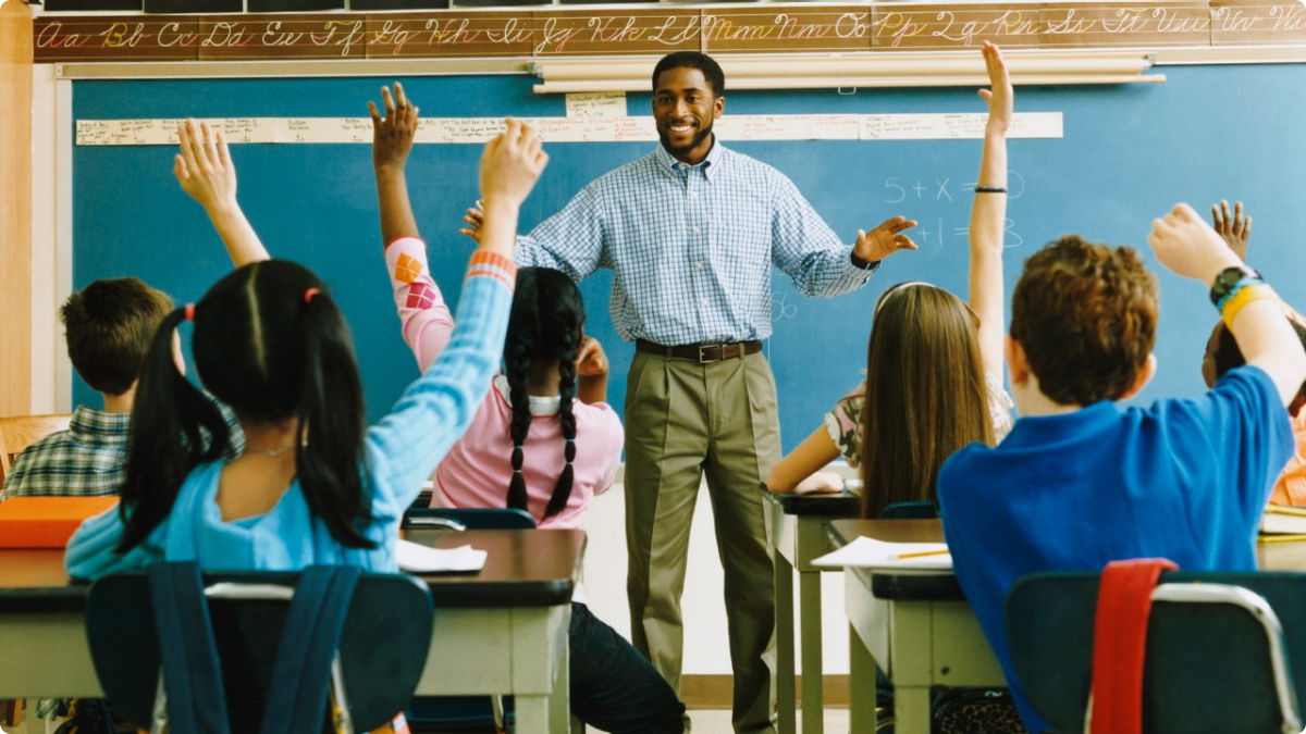 African-American Male Teacher Classroom Standing LARGE.png