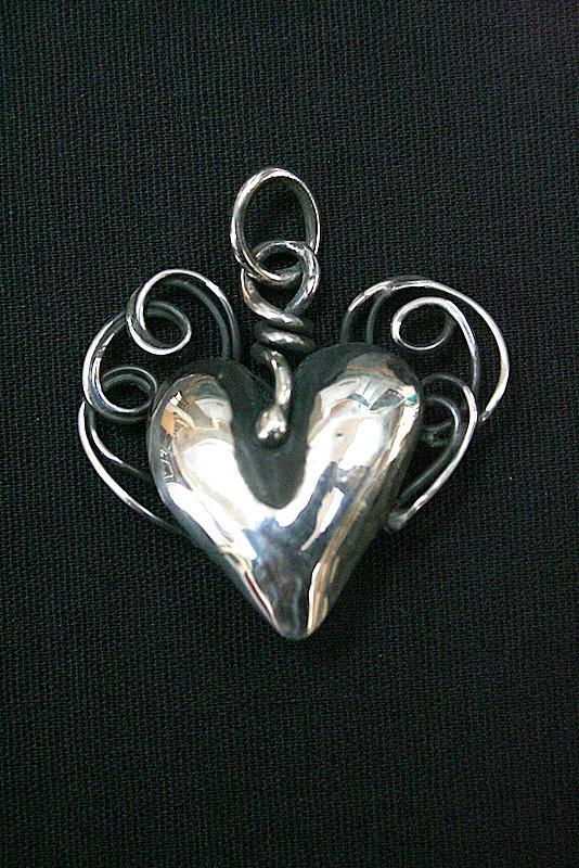 Silver Heart with twisted arms