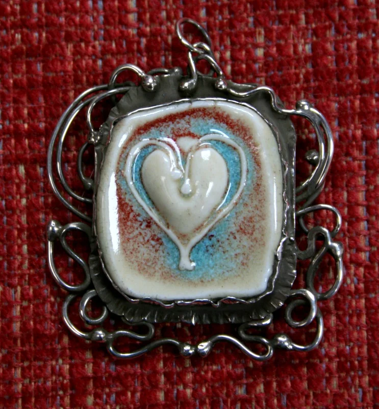 Ceramic Heart mounted in silver