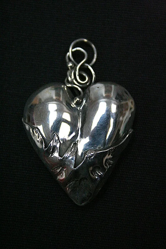 Silver Heart with flames
