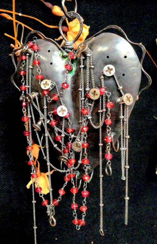black screwed with garnet beads