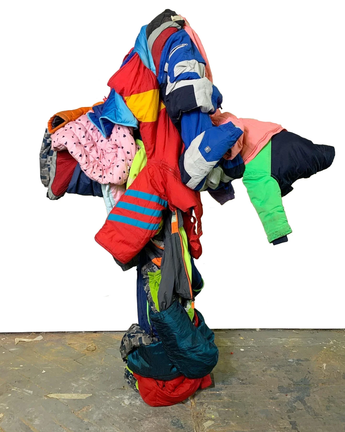  Merquery City Meltdown  Upcycled Jackets, Wood, Metal, Glue  60” x 50” x 15”   