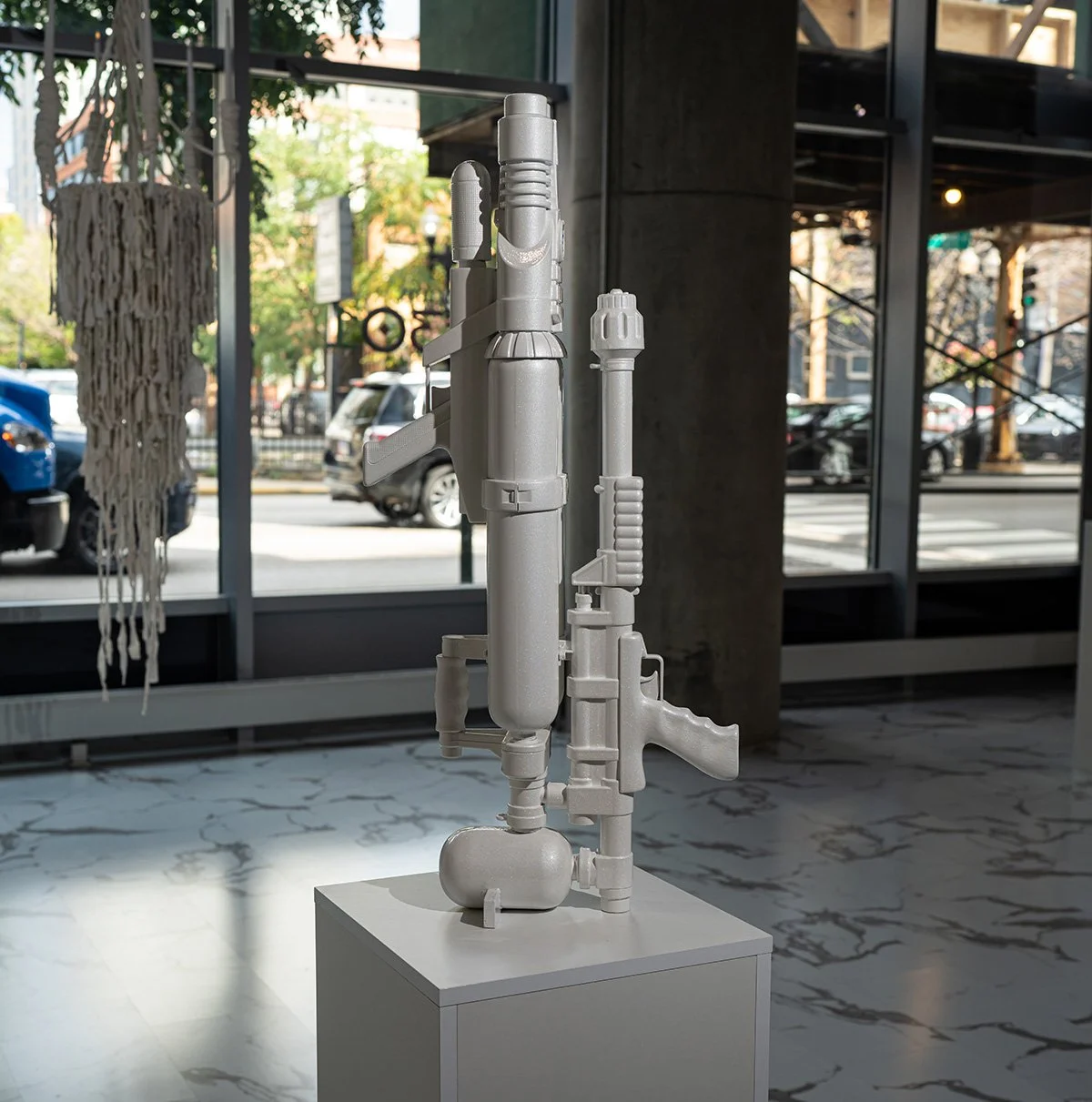  Un acquired Taste  Squirt guns, plastic, automotive paint  36” x 22” x 10”  2024 