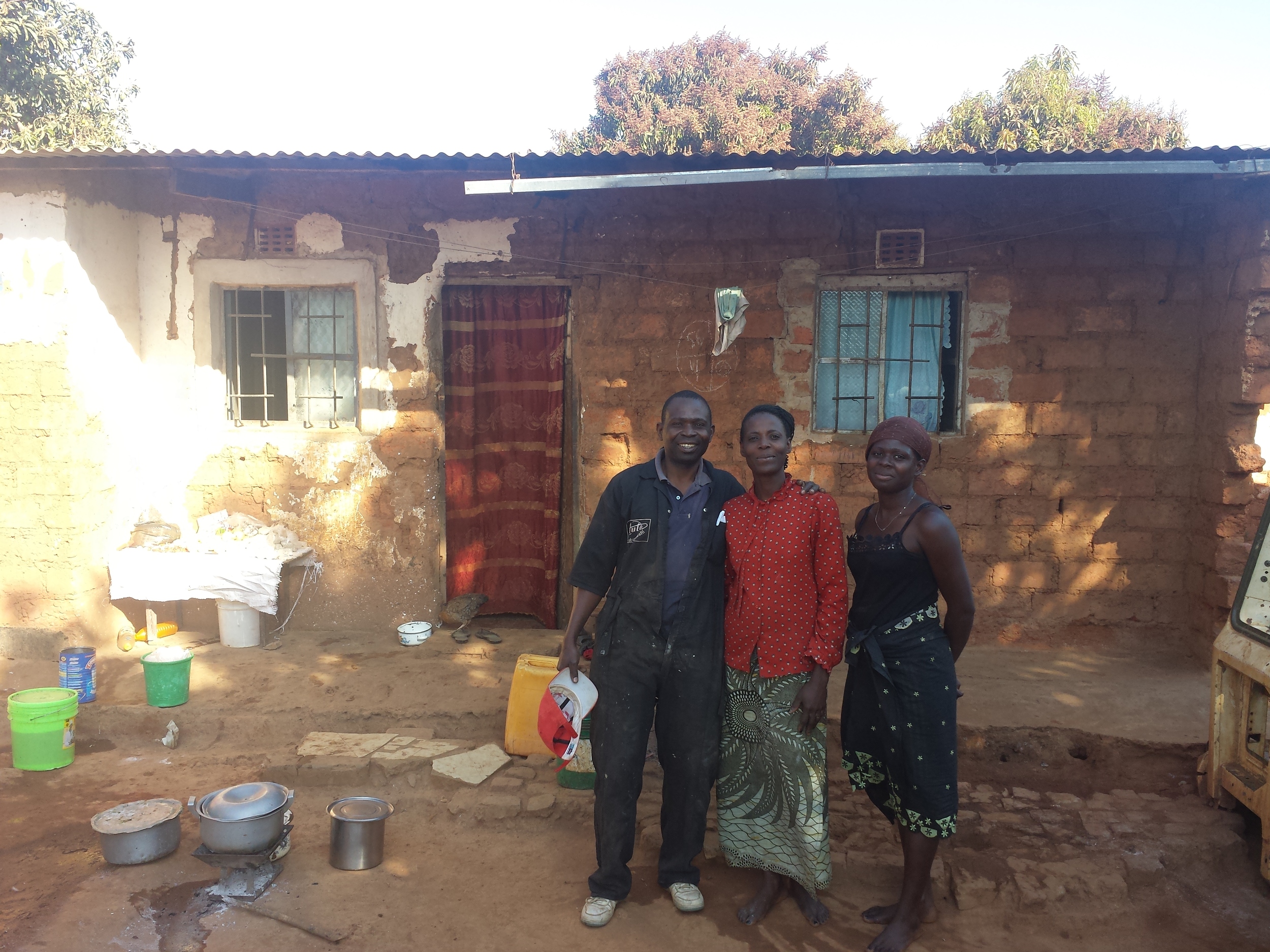 This is Andre, his wife and one of his 7 children.