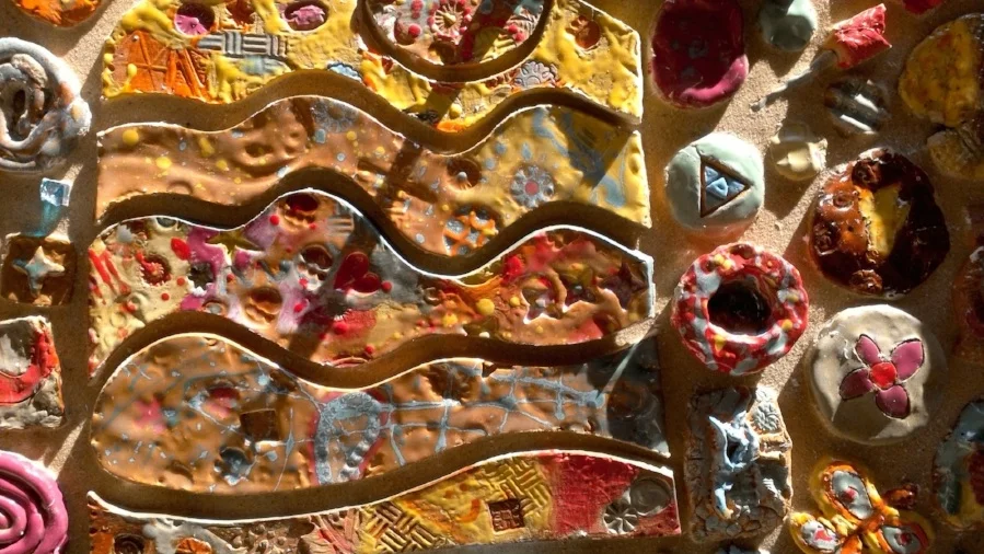 Ceramic pieces made by kids, bronze pieces by Lisa Blubaugh