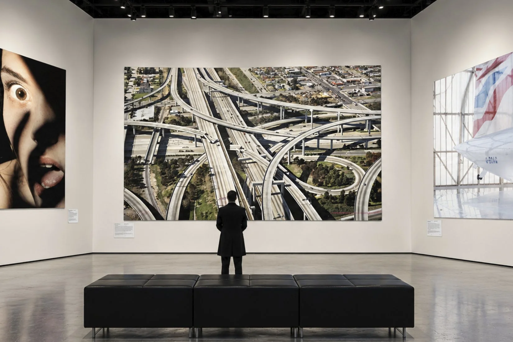 Gallery visualisation presenting photographs by Norbert Schoerner, Robert Polidori and Robert Wyatt, from left to right.